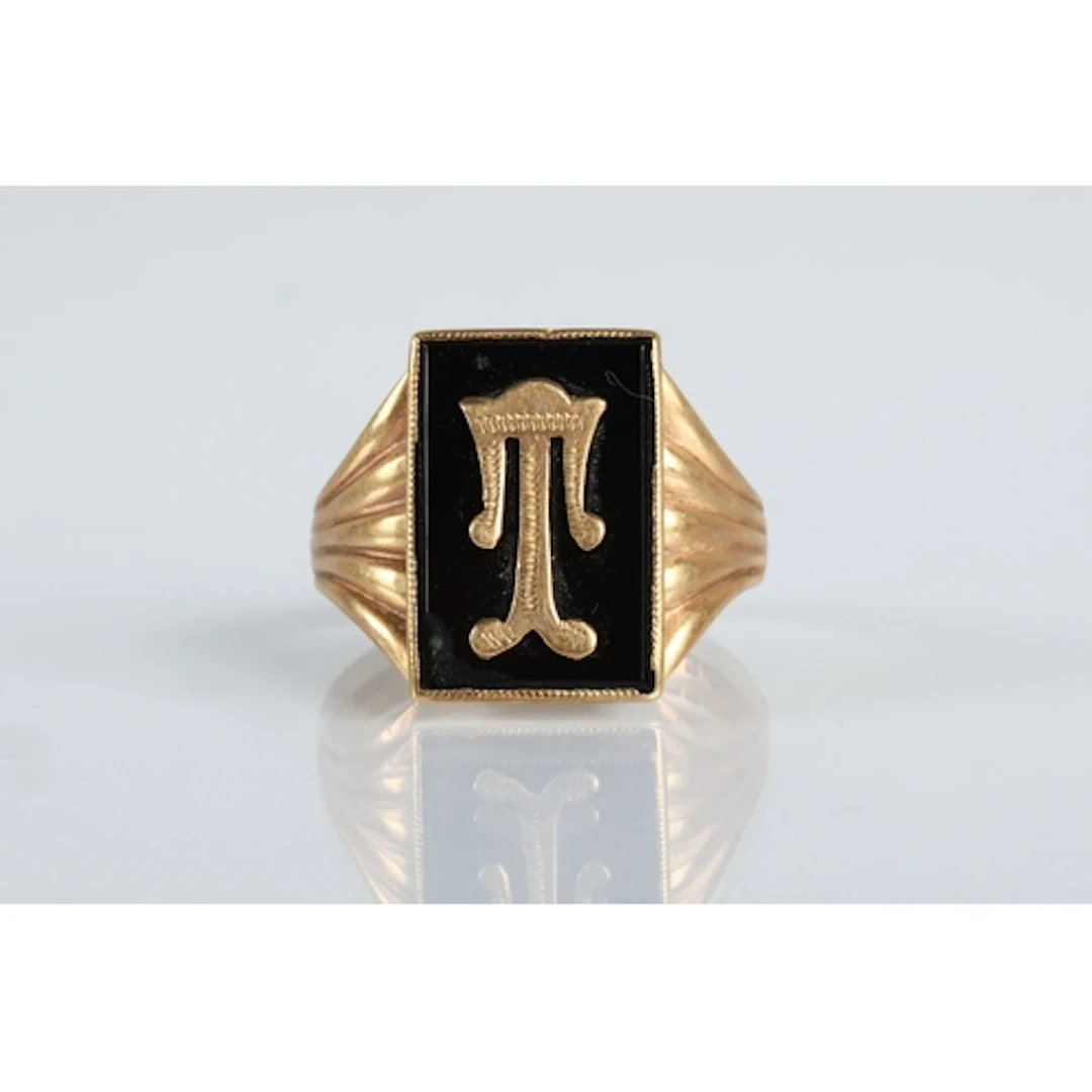 Gents 9ct gold signet ring set with black onyx and depicting...