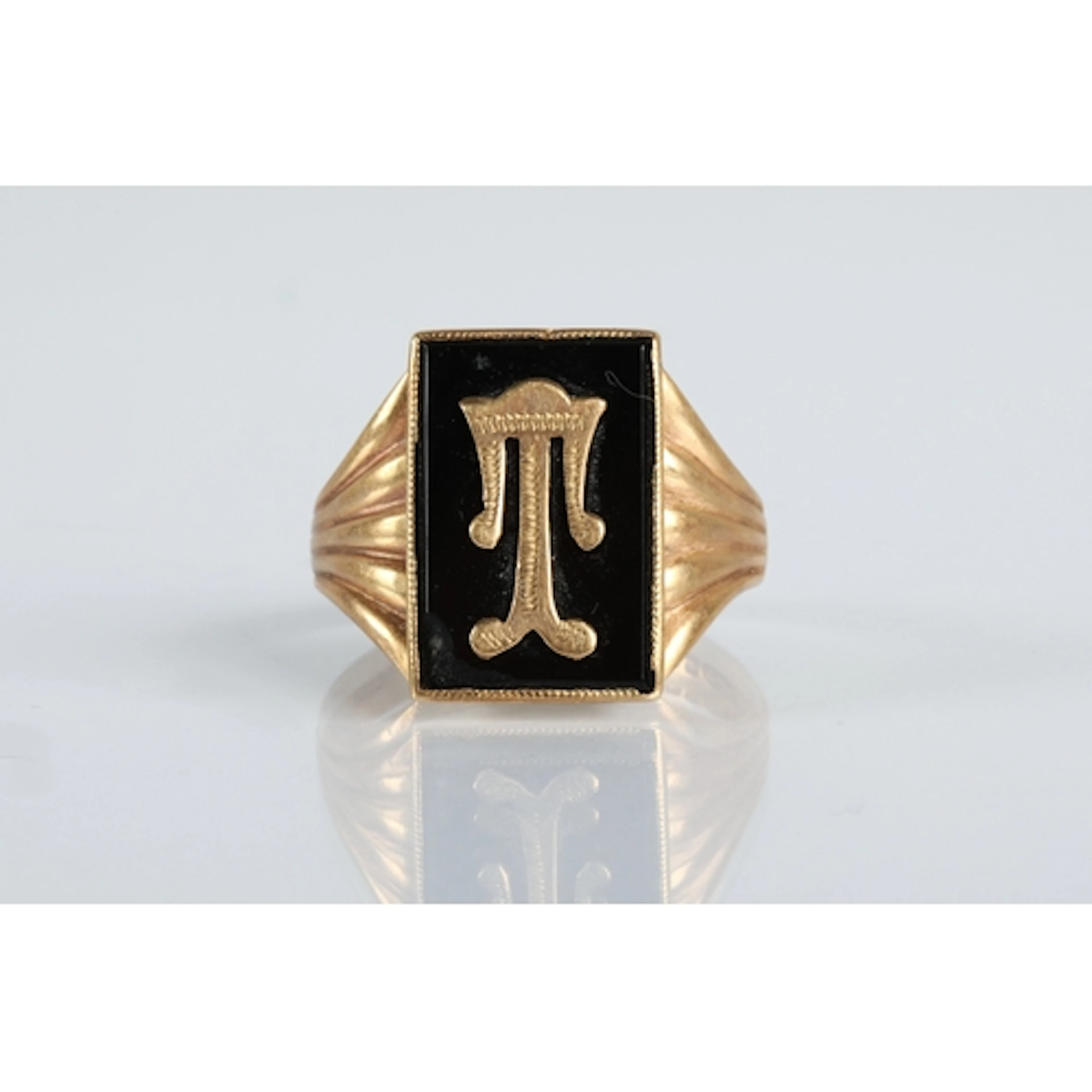 Gents 9ct gold signet ring set with black onyx and depicting...