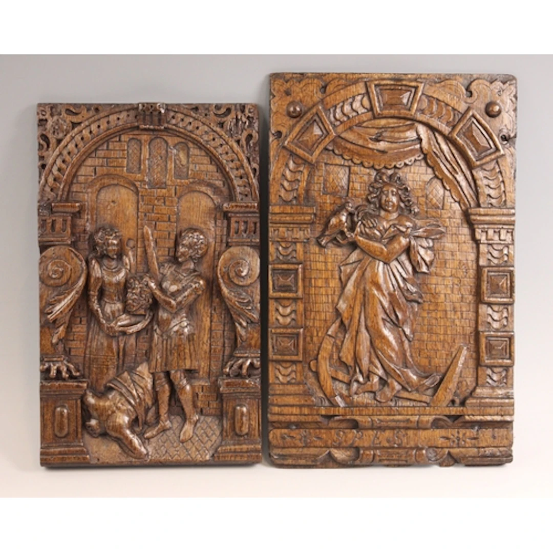 Two 17th century style carved oak bas-relief panels in the F...