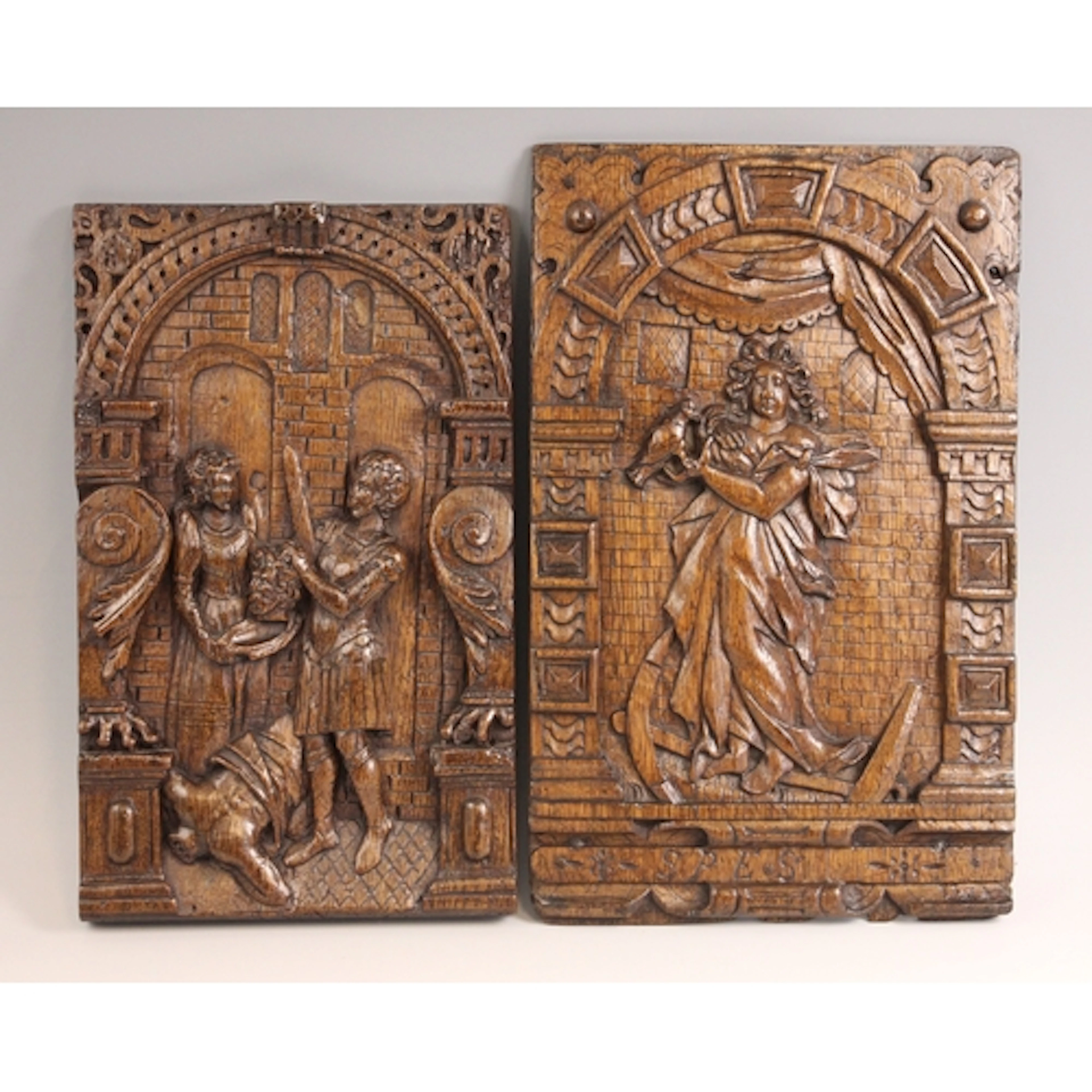 Two 17th century style carved oak bas-relief panels in the F...
