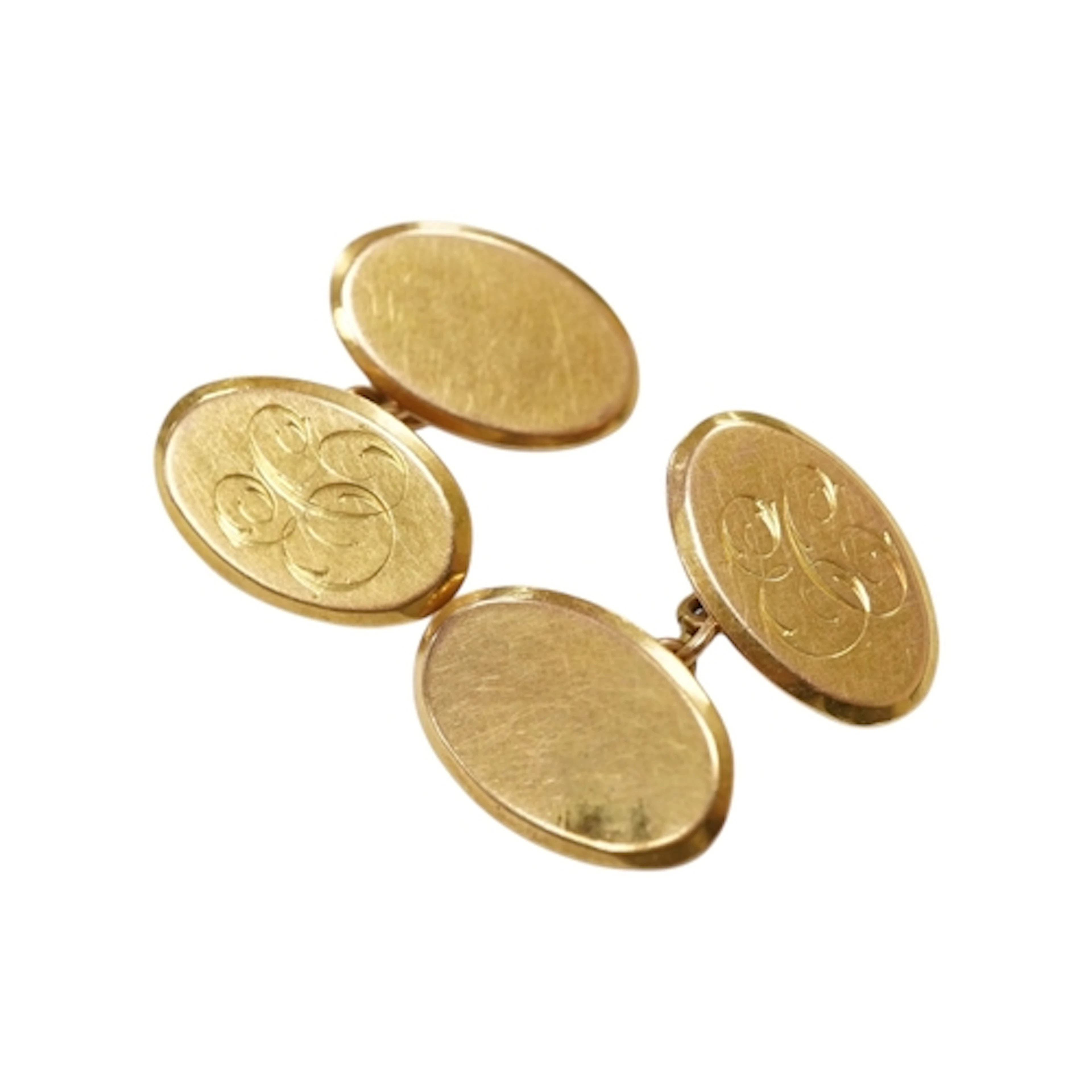 A pair of George V 9ct gold oval cufflinks, engraved with th...