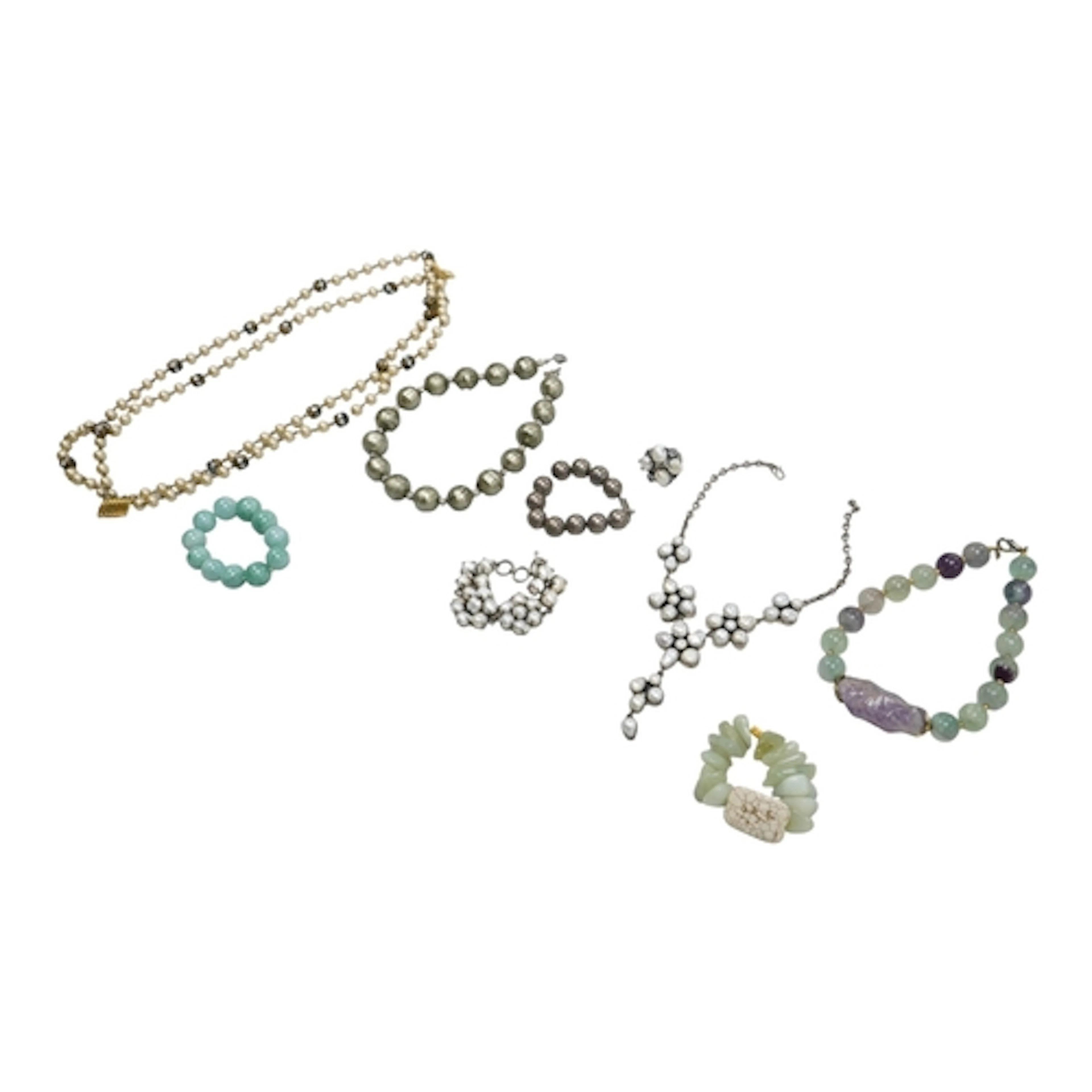 A collection of jewels, comprising: a suite of cultured pear...