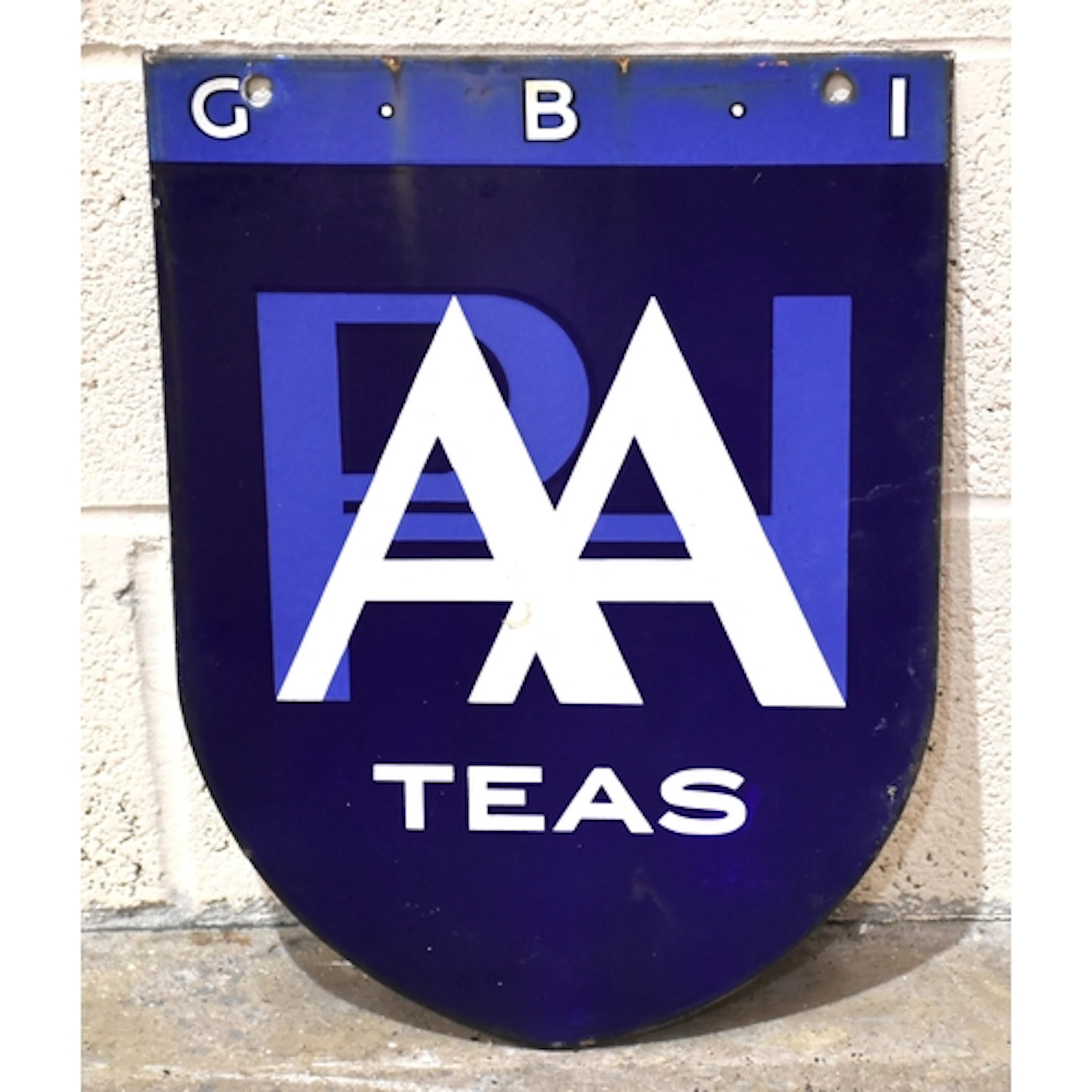 A double-sided shield-shaped "AA Teas" enamelled advertising...