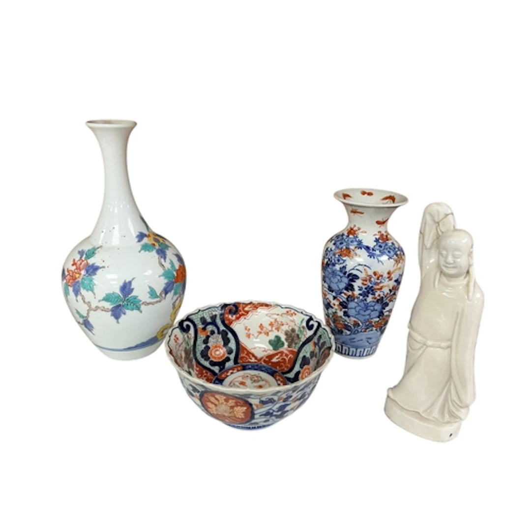 A group of Japanese and Chinese ceramics, comprising a Japan...