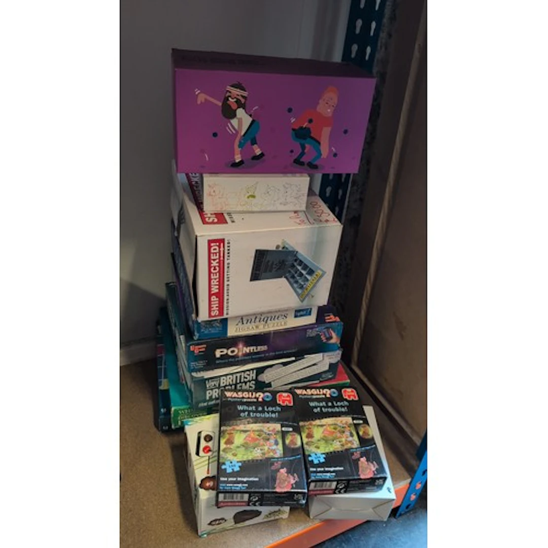 A quantity of boxed board games and jigsaw puzzles, includin...