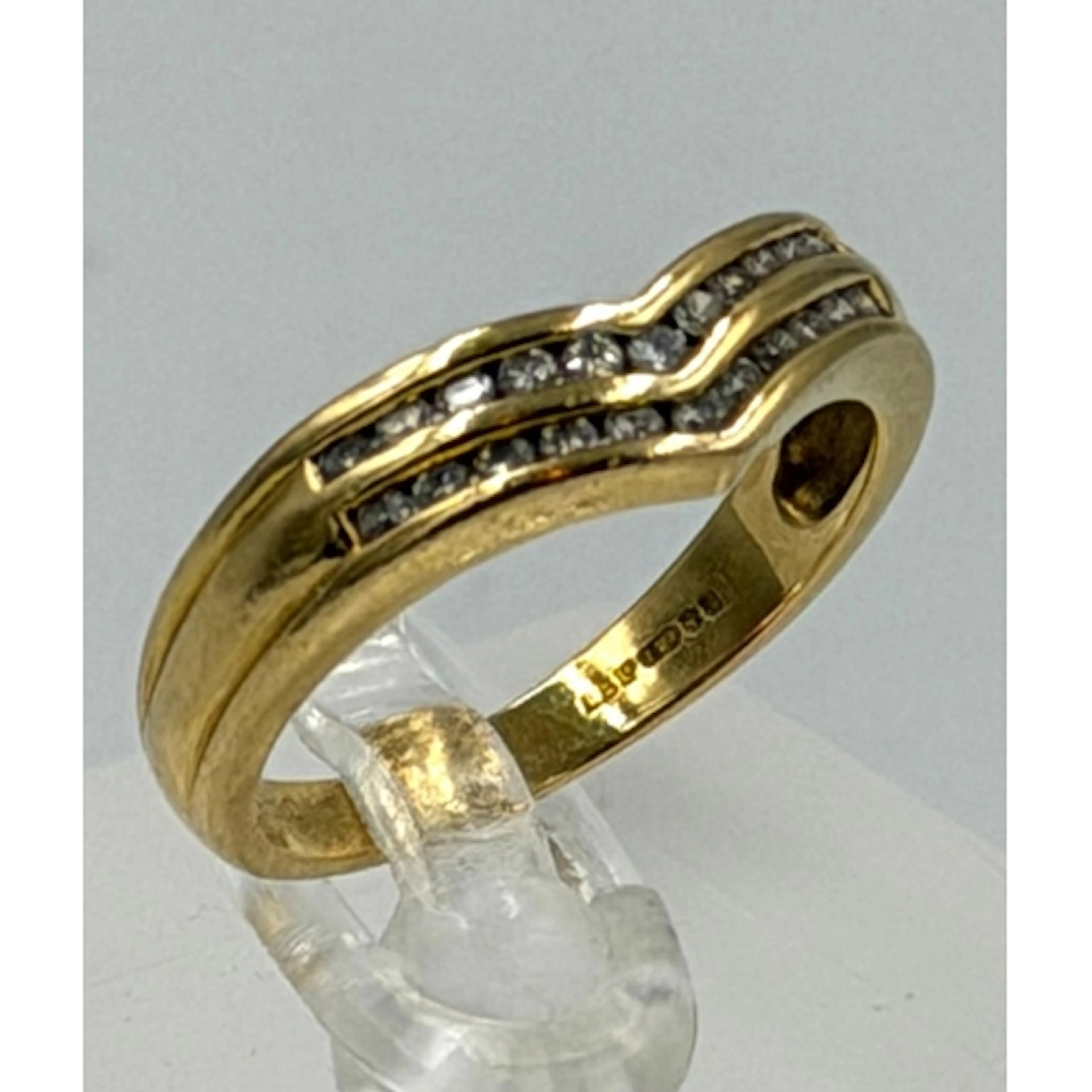An 18ct yellow gold and diamond wishbone ring, approximate w...