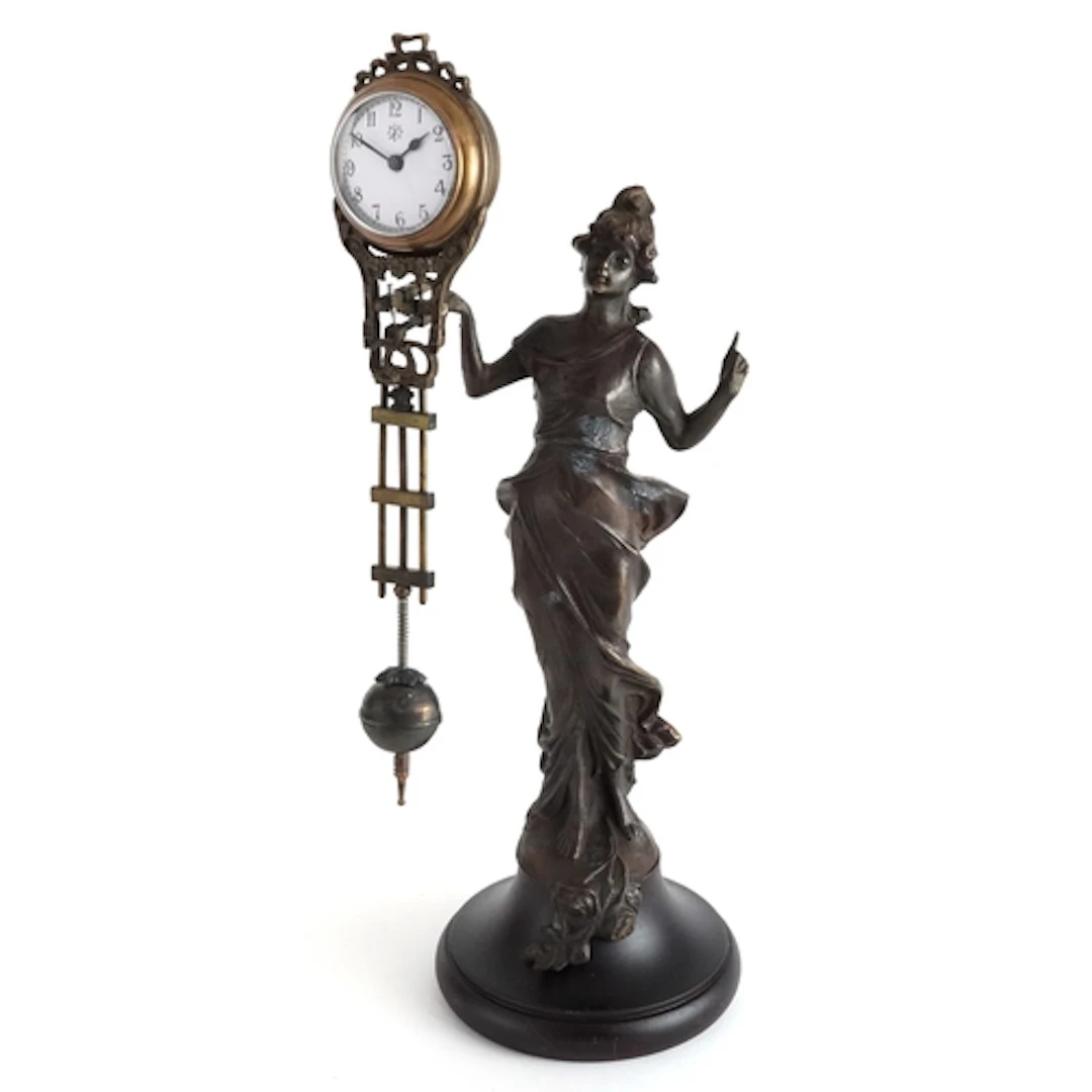 Patinated spelter mystery clock in the form of an Art Nouvea...