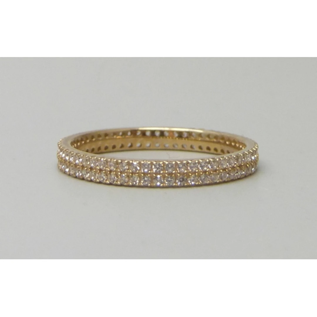 A 9ct gold and cubic zirconia eternity ring, 1.5g, P