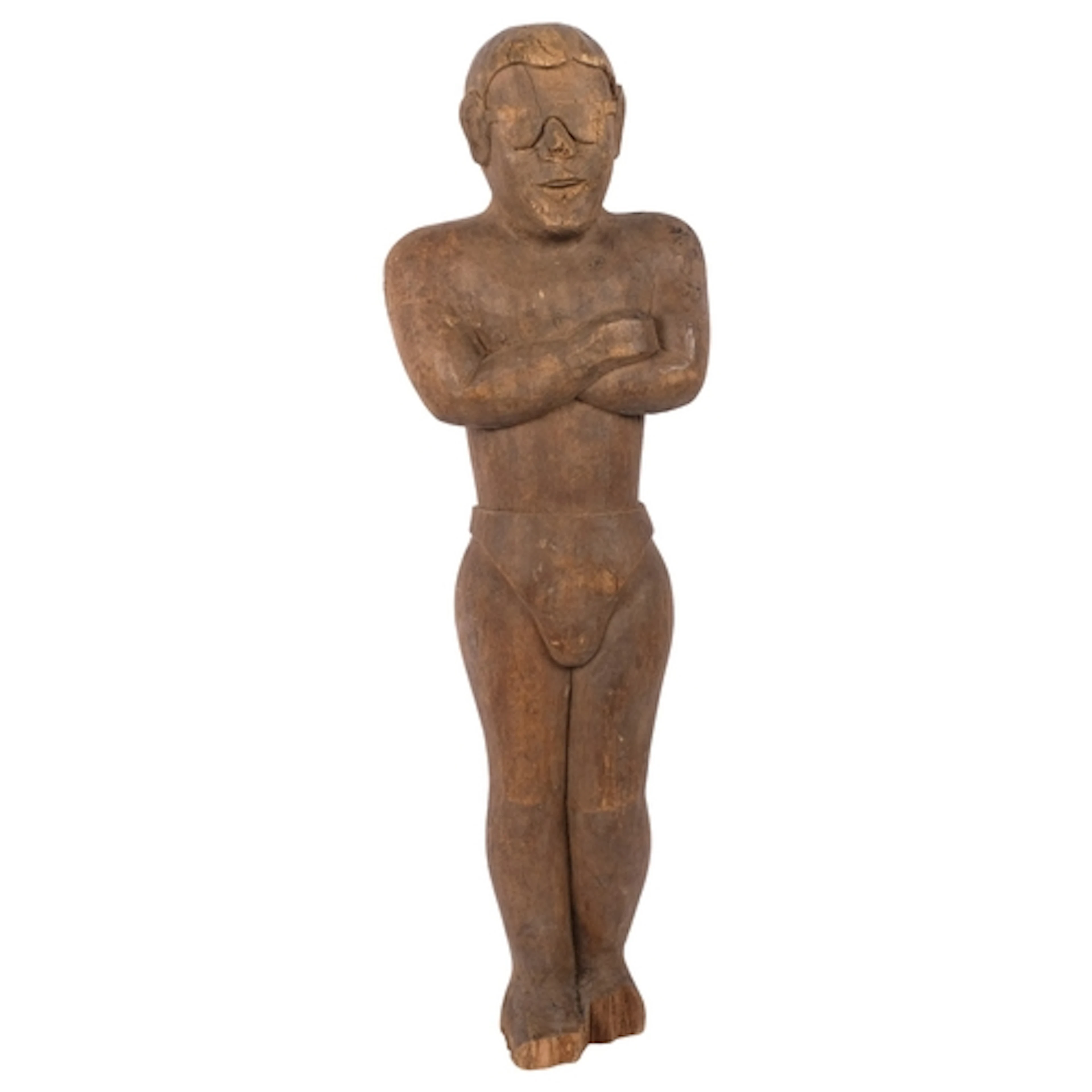 A carved free-standing figure of a man, with sunglasses and ...