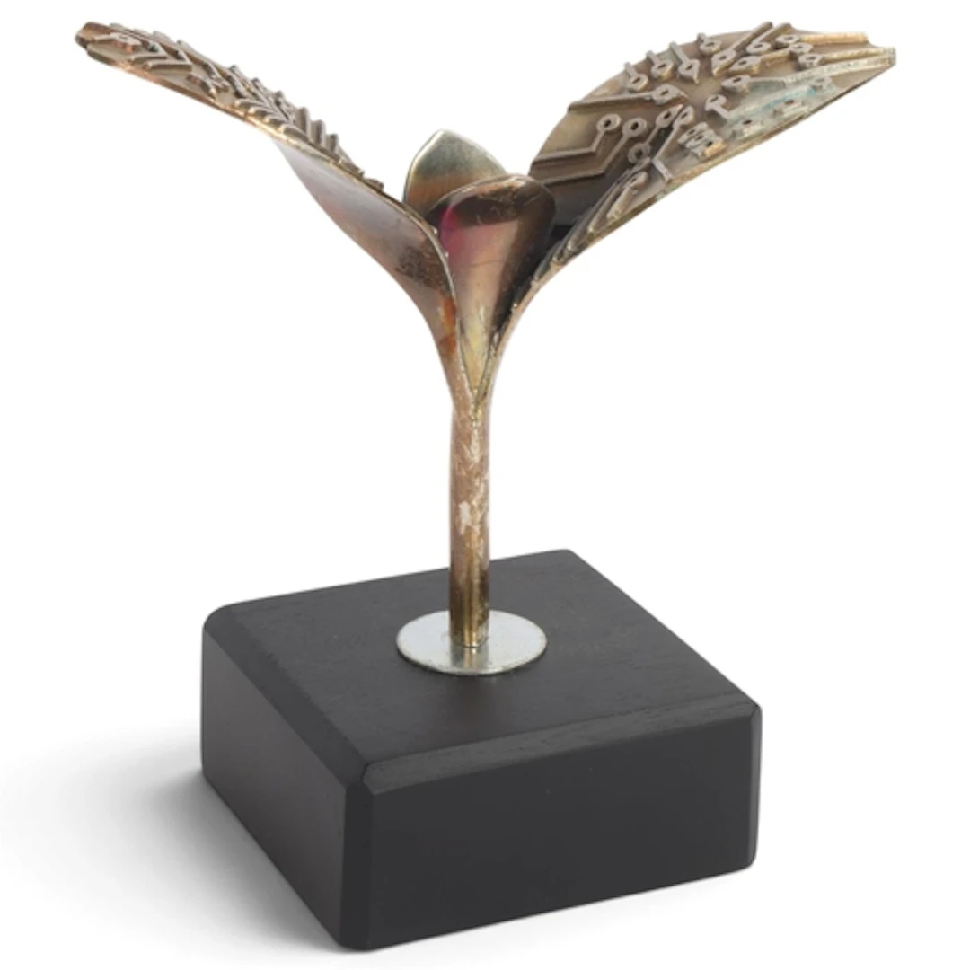 DAVID HUGHES, a budding plant sculpture in silver plated ste...