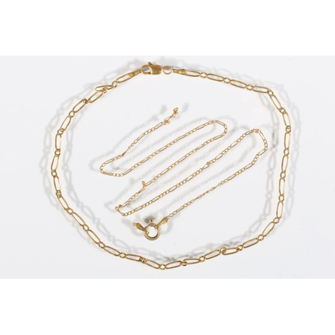 Gold tone bracelet, the clasp stamped '18KT ITALY', 2.7g and...