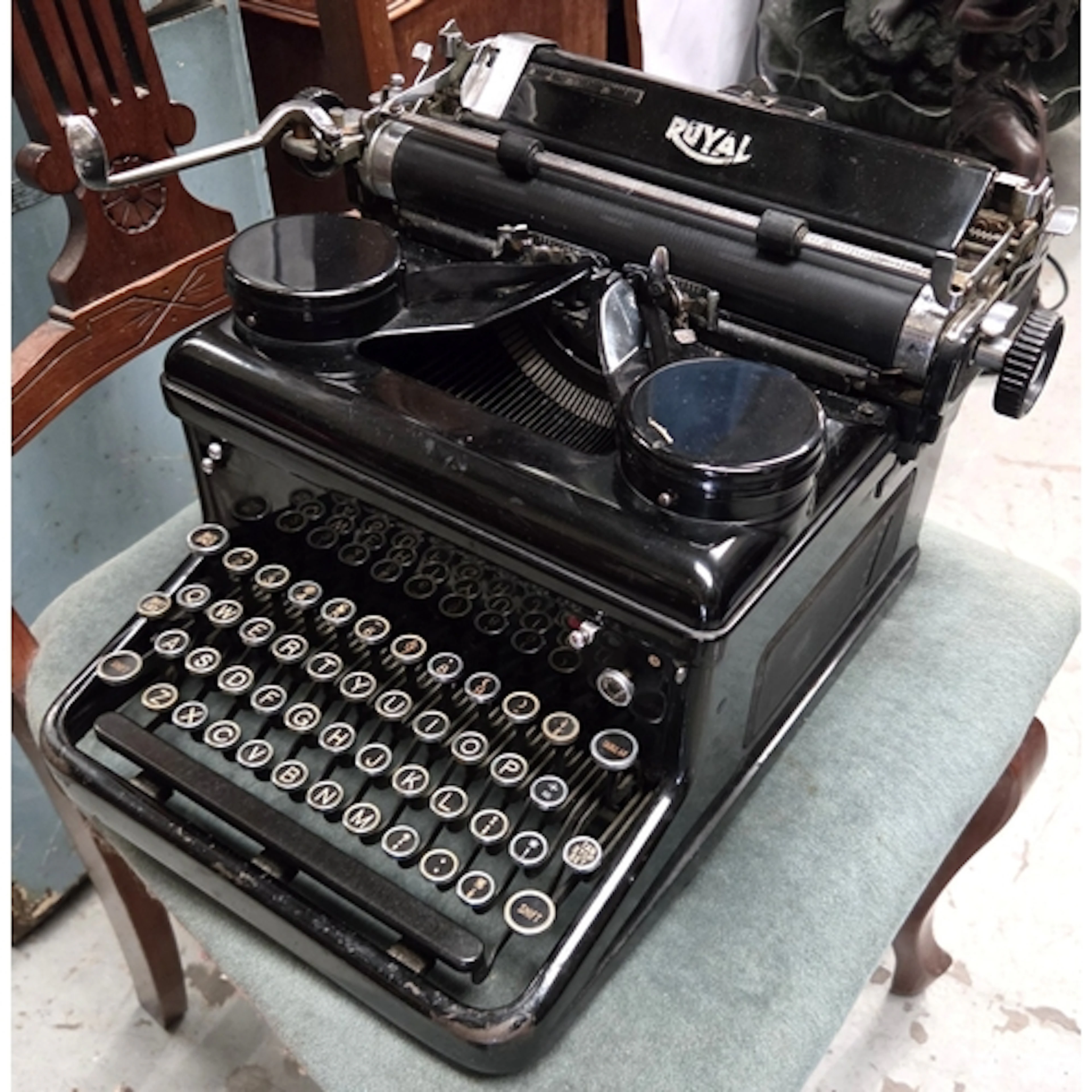 A vintage Royal typewriter vintage slide projectors etc
