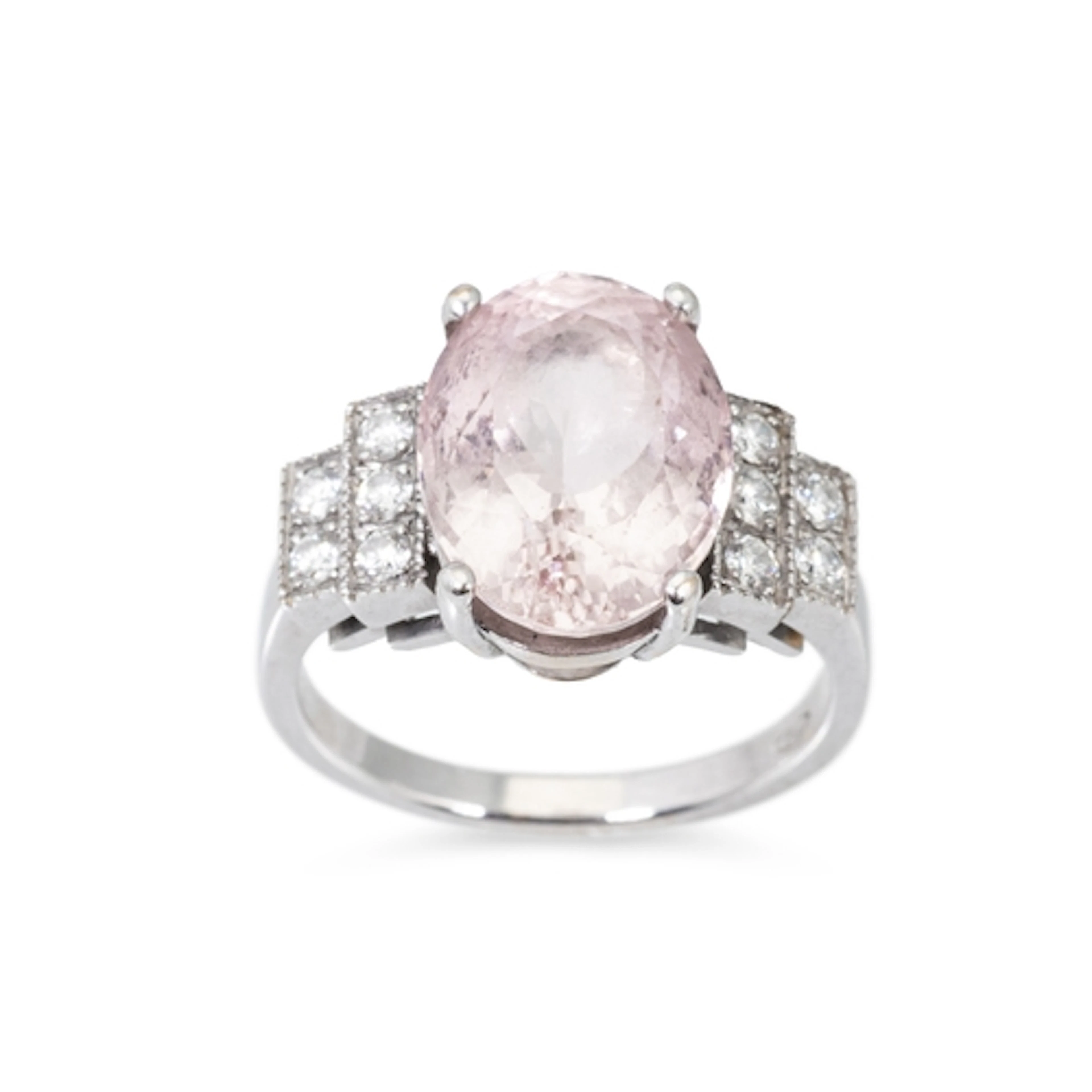 A MORGANITE AND DIAMOND RING, the oval morganite to diamond ...