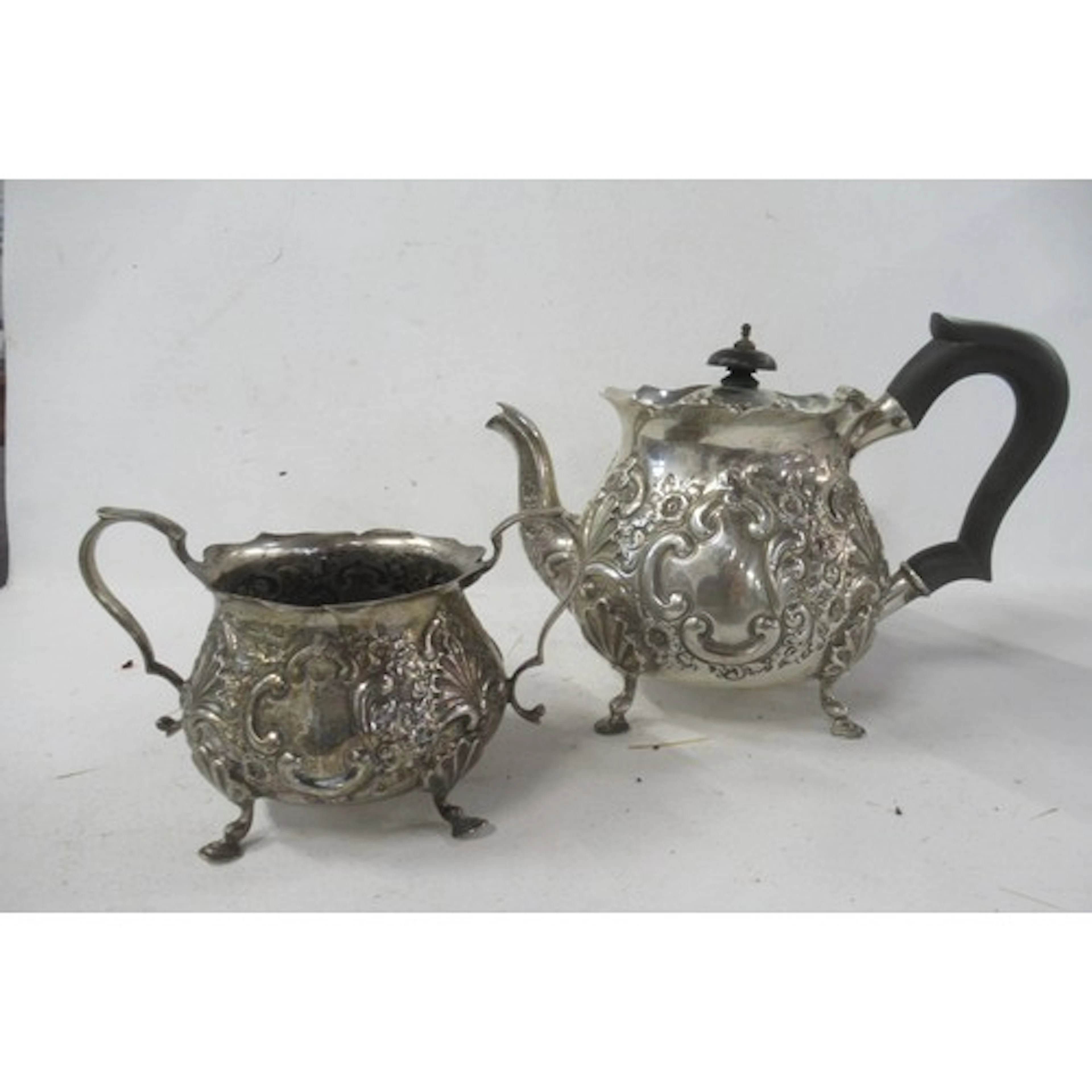 A silver tea pot, together with sugar bowl, weight 18oz all ...