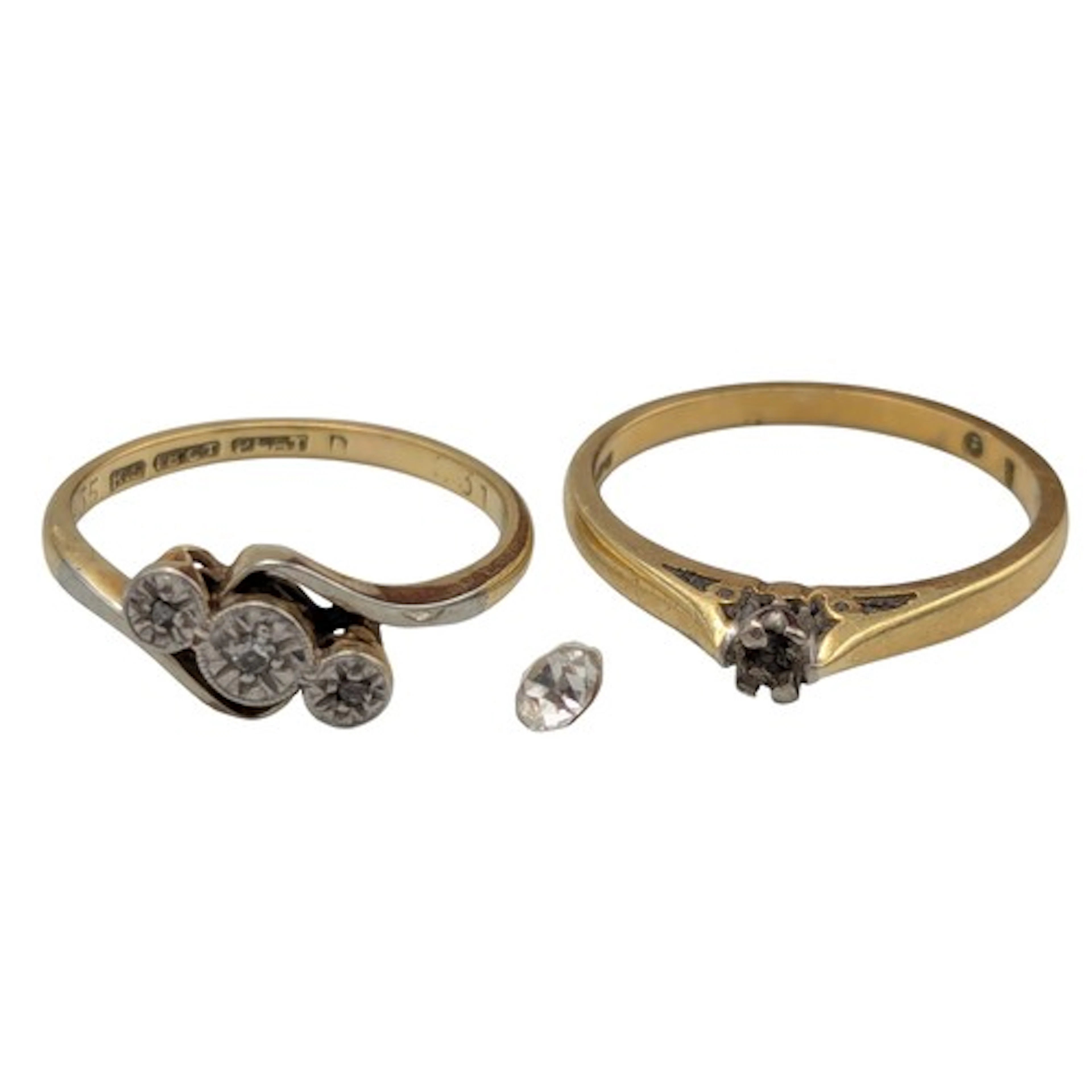 An 18ct gold diamond solitaire, diamond loose, 2.4g; an 18ct...