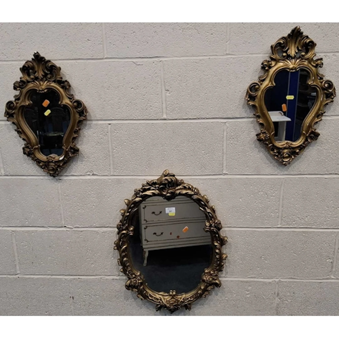 THREE GILT GESSO WALL MIRRORS, all with scrolled and foliate...