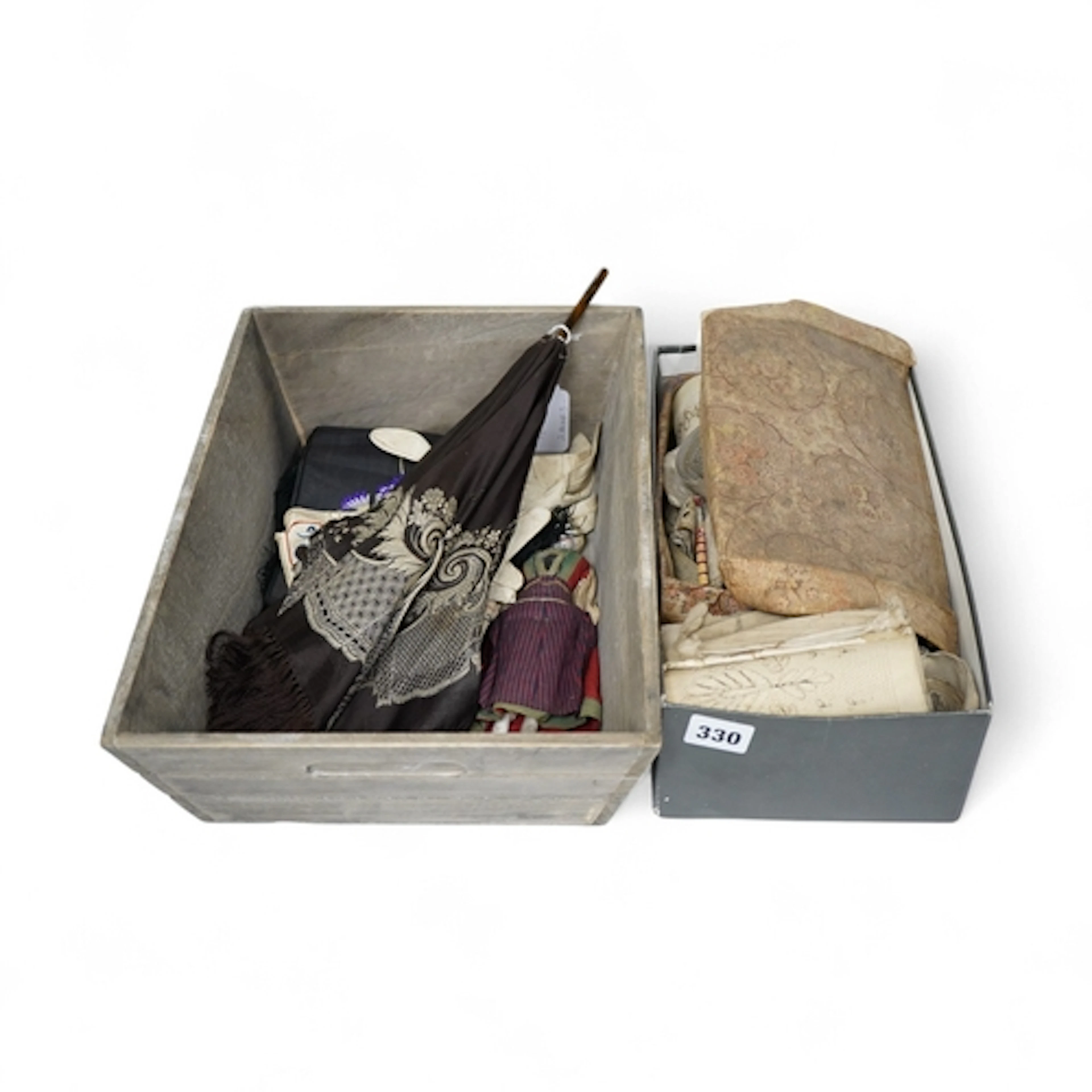 A collection of 19th century lace making patterns, a pair of...