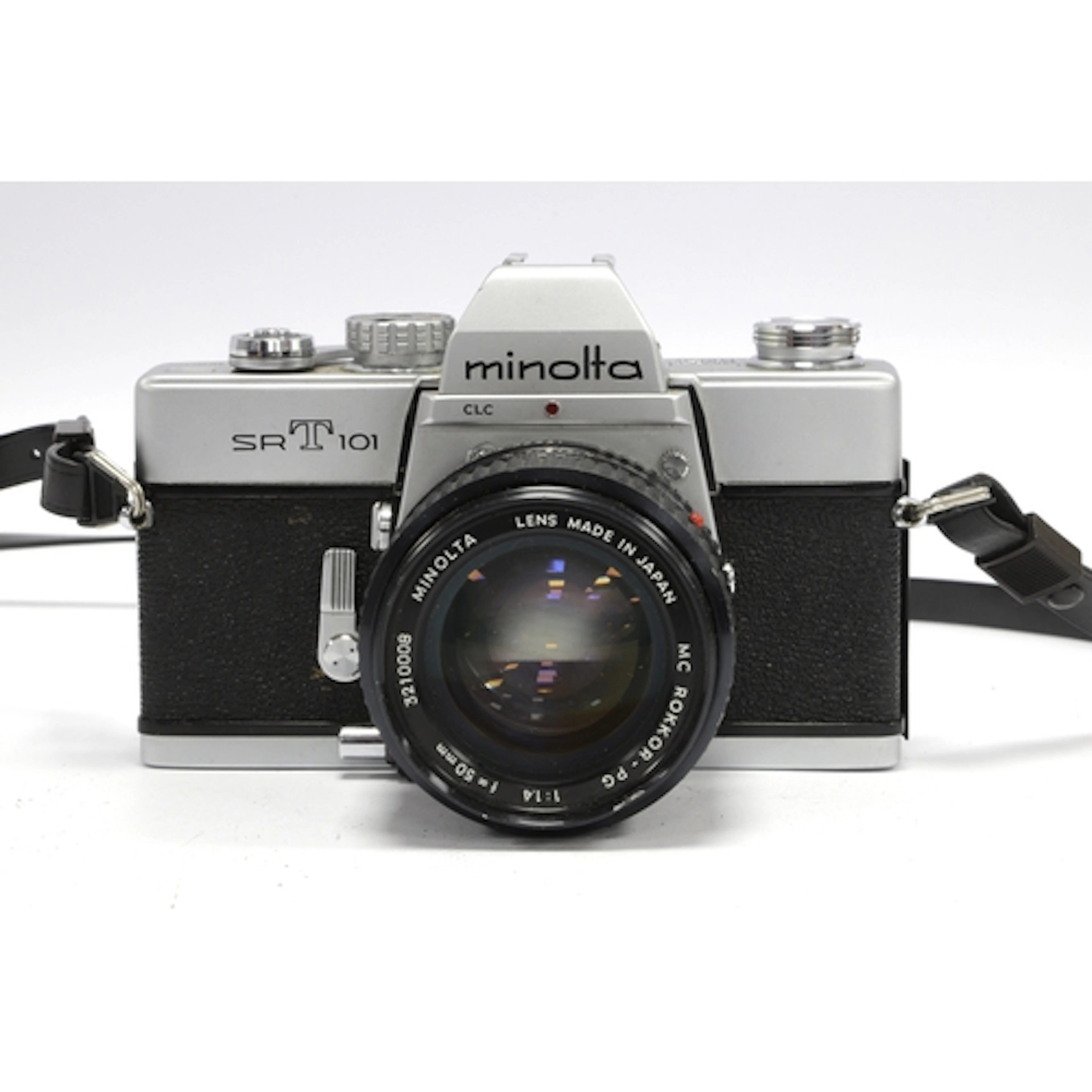 Minolta SRT101 35mm SLR Film Camera with attached Minolta MC...