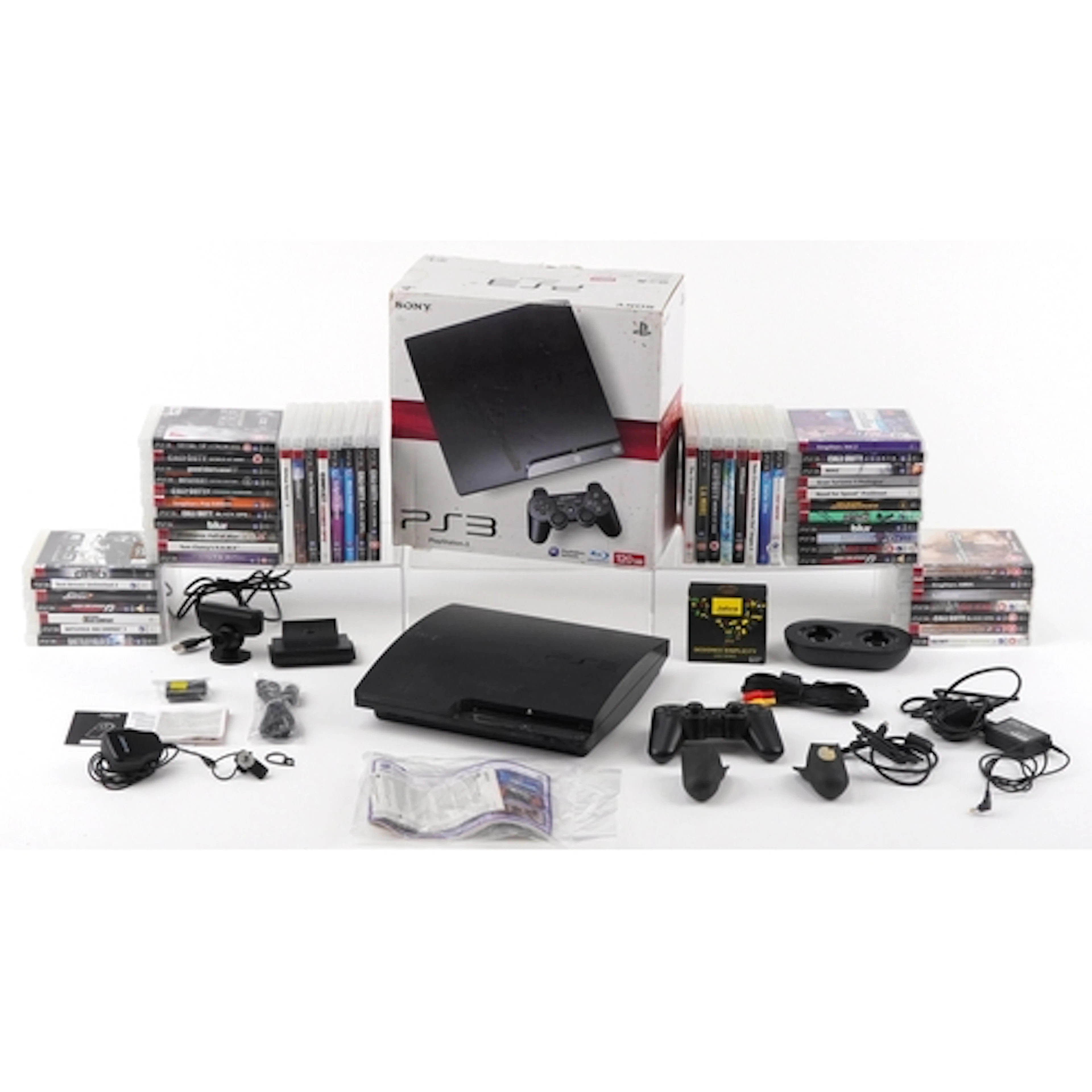 Sony PlayStation PS3 games console with controller, accessor...