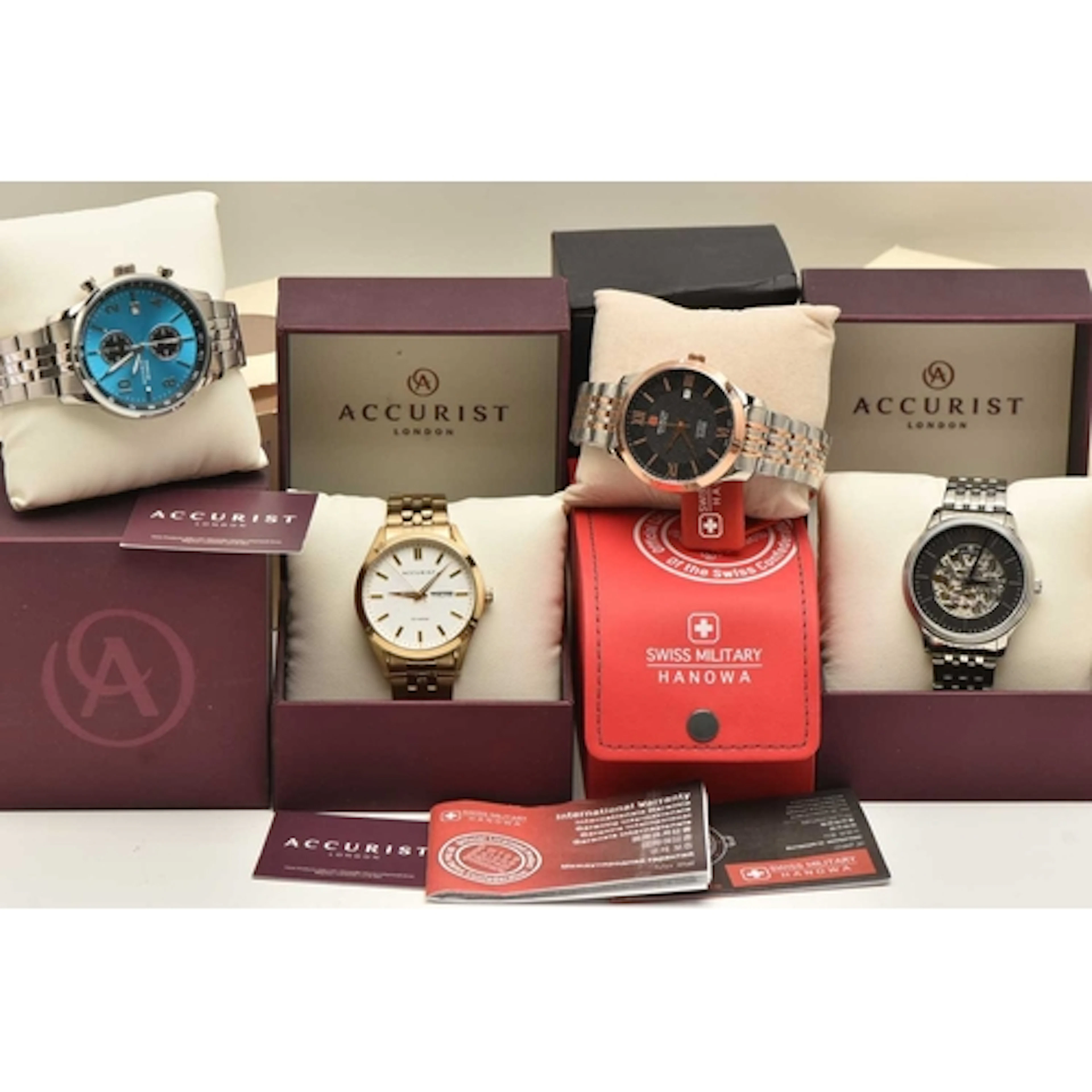 FOUR WRISTWATCHES, to include three boxed 'Accurist' wristwa...
