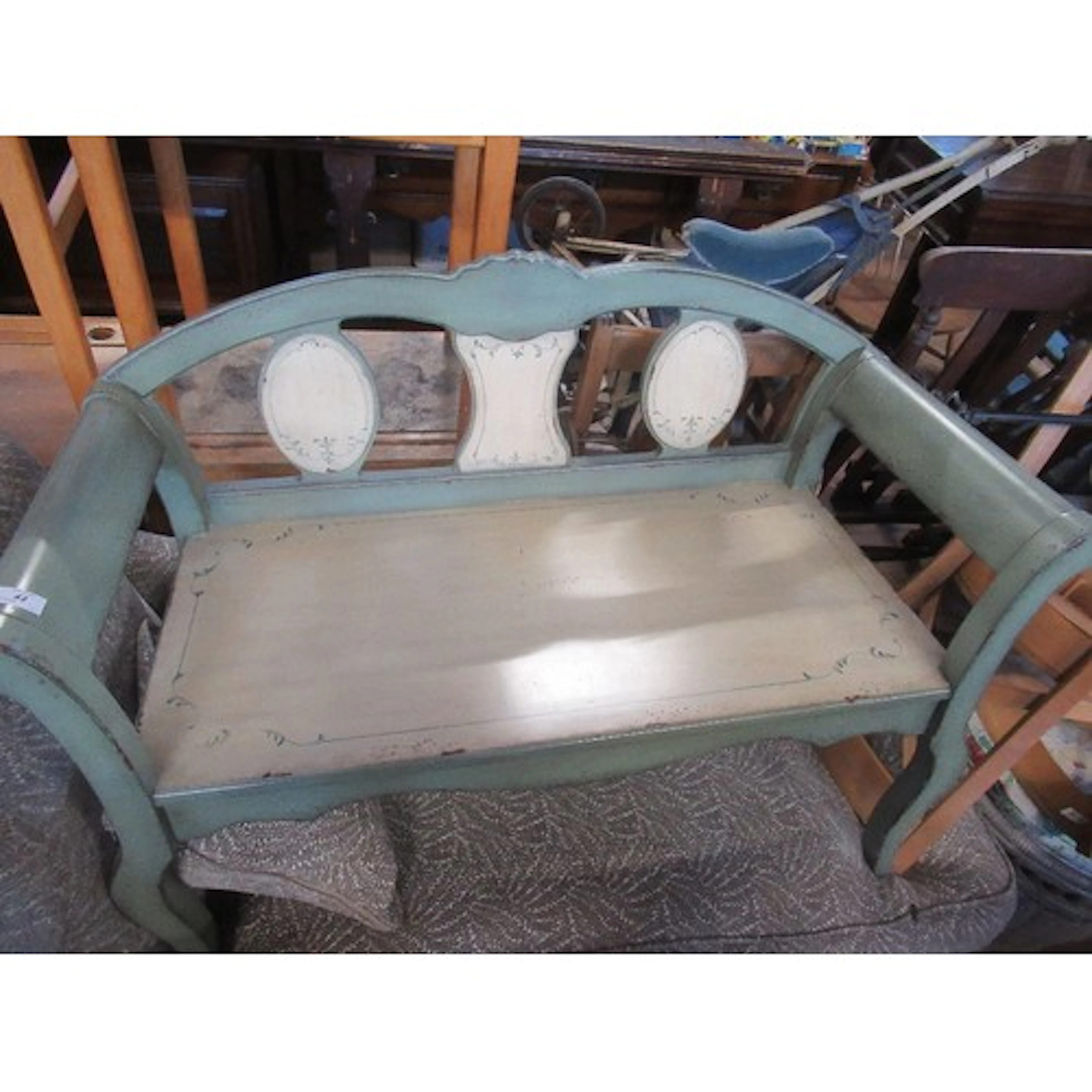 A contemporary painted bench
