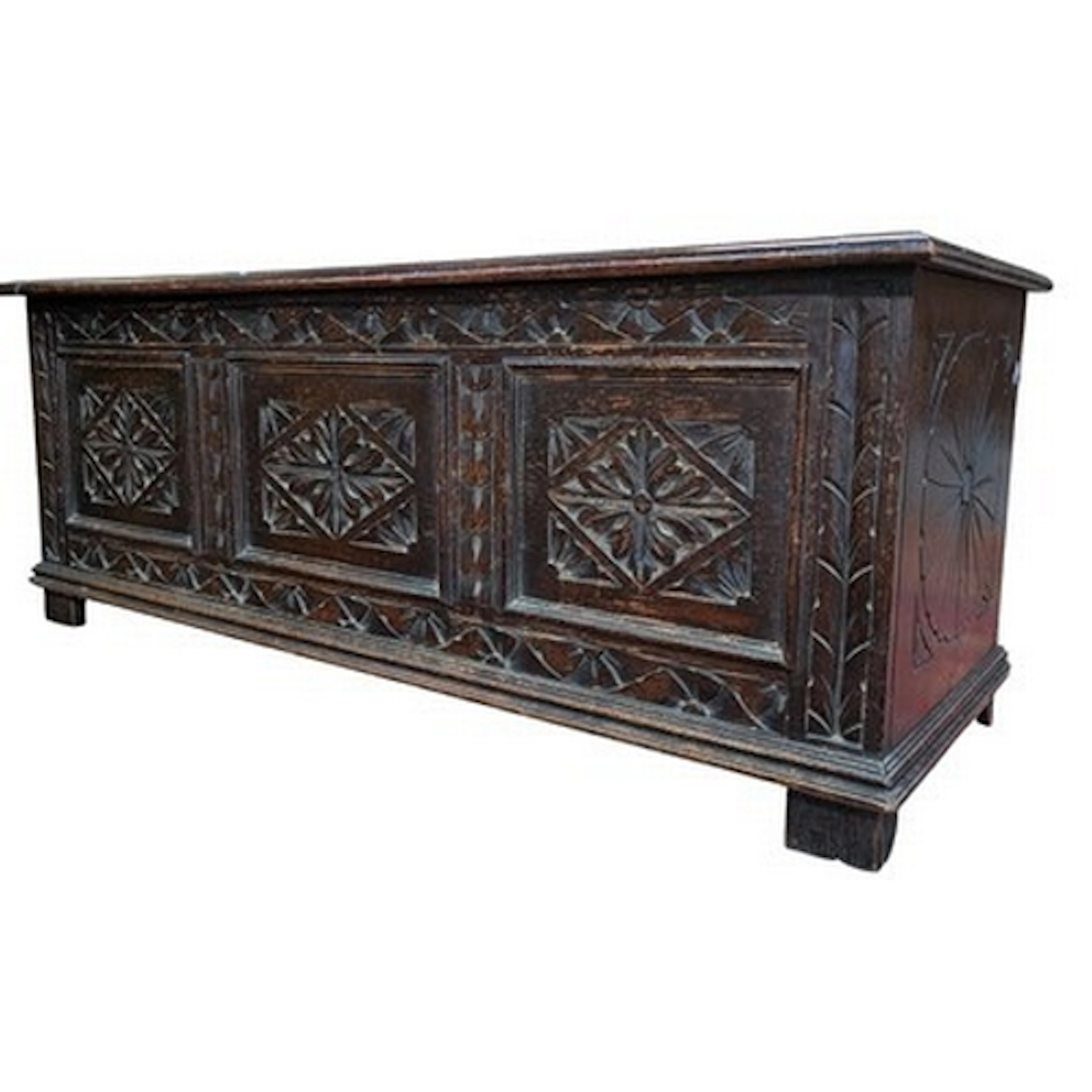An 18th century carved oak coffer chest. The coffer having a...