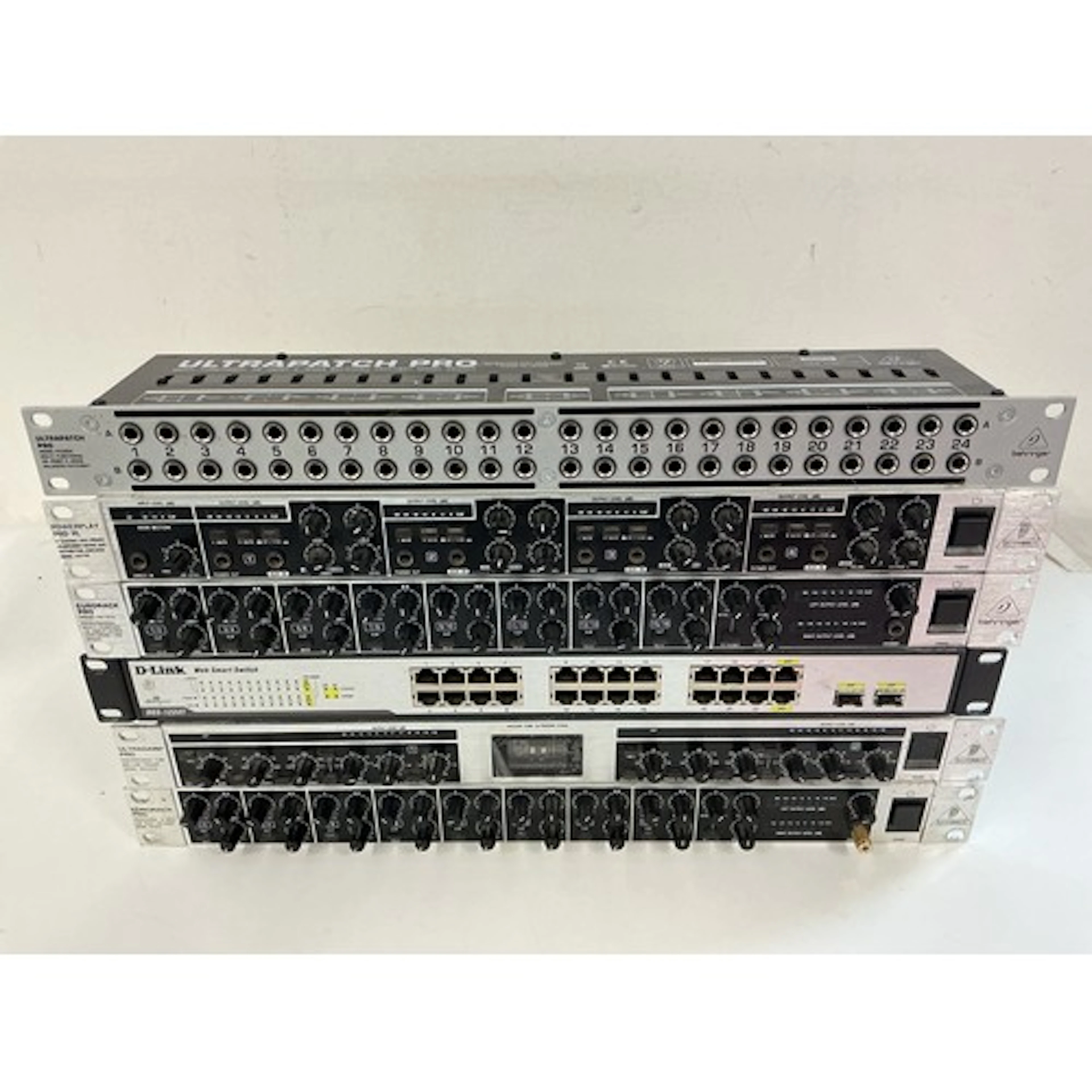 A collection of rack effects units comprising two Behringer ...