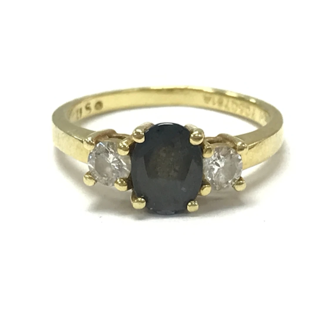An 18ct gold Alexanderite and diamond ring, size N, 4g total...