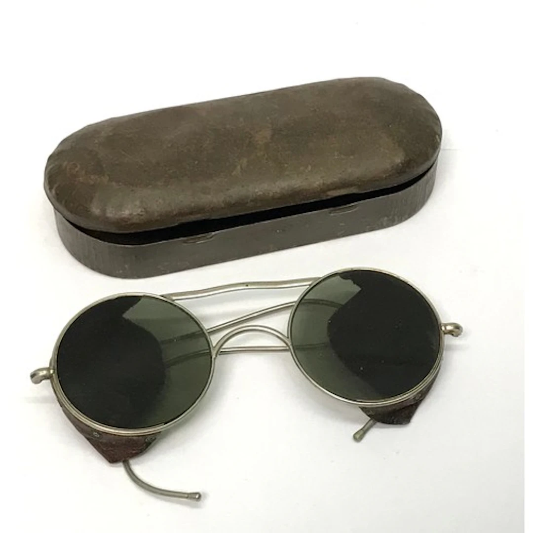 A pair of RAF / Air Ministry WW2 anti-glare sunglasses compl...