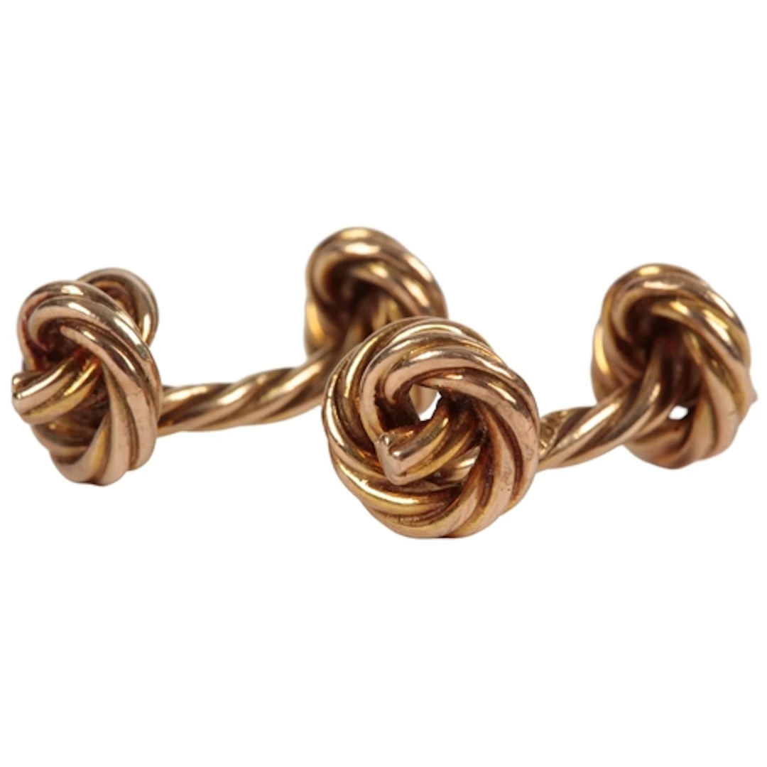 Asprey, a pair of 9ct gold cufflinks, circa 1981, each of kn...