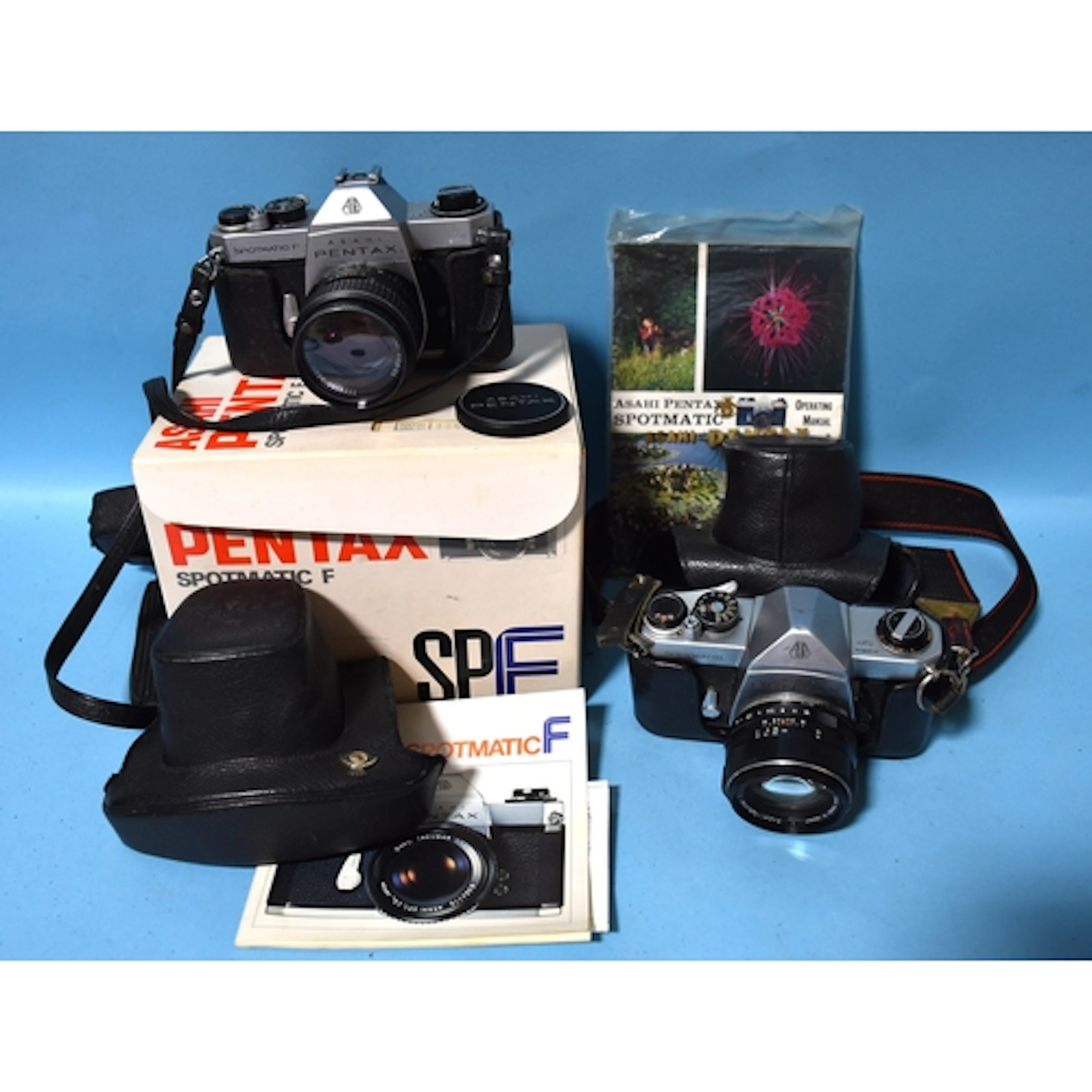 A Pentax Spotmatic F camera with SMC Takumar 1:1.8 f55 lens,...