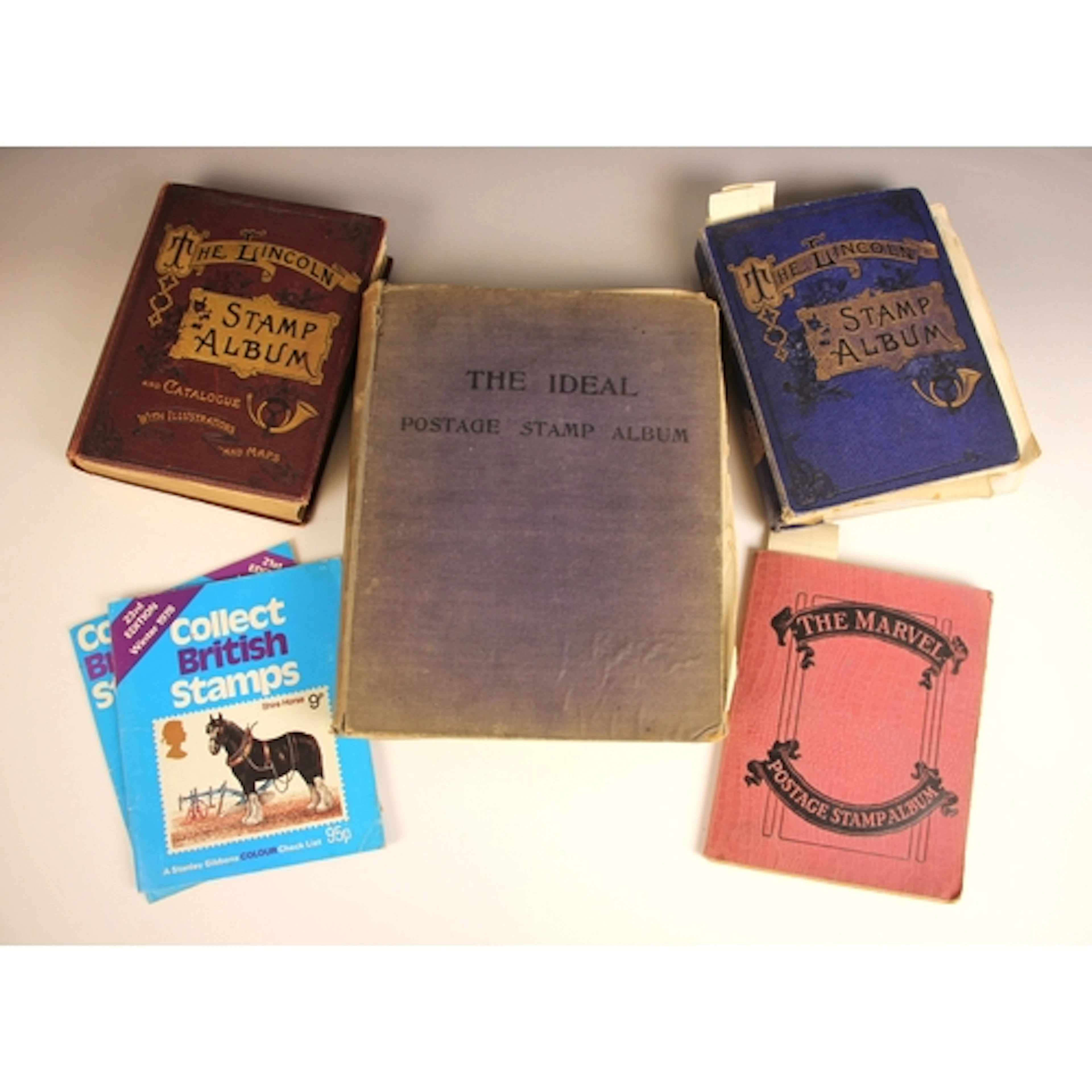 A World collection of stamps to two old Lincoln albums, and ...