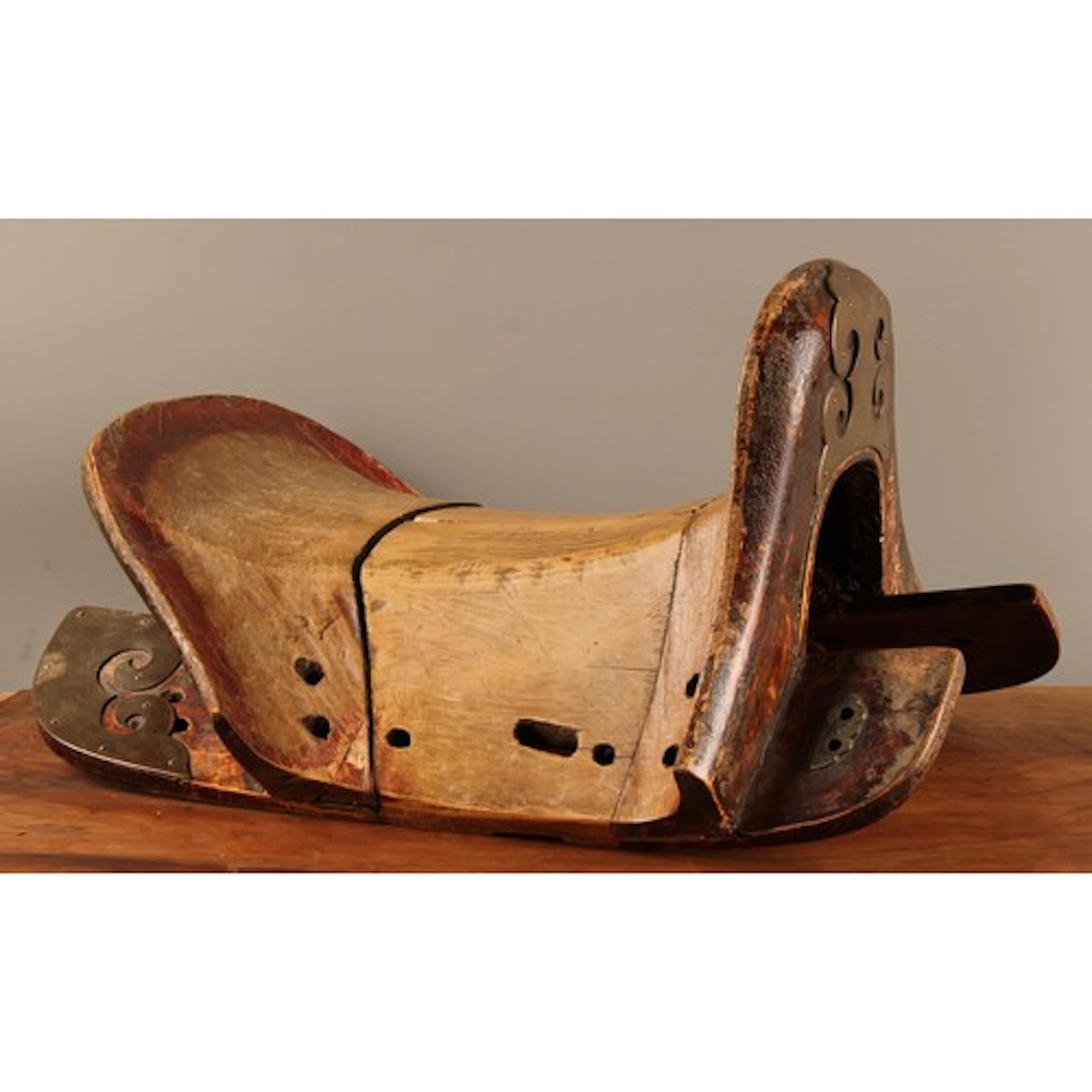 A 19th century Chinese brass mounted hardwood saddle, applie...