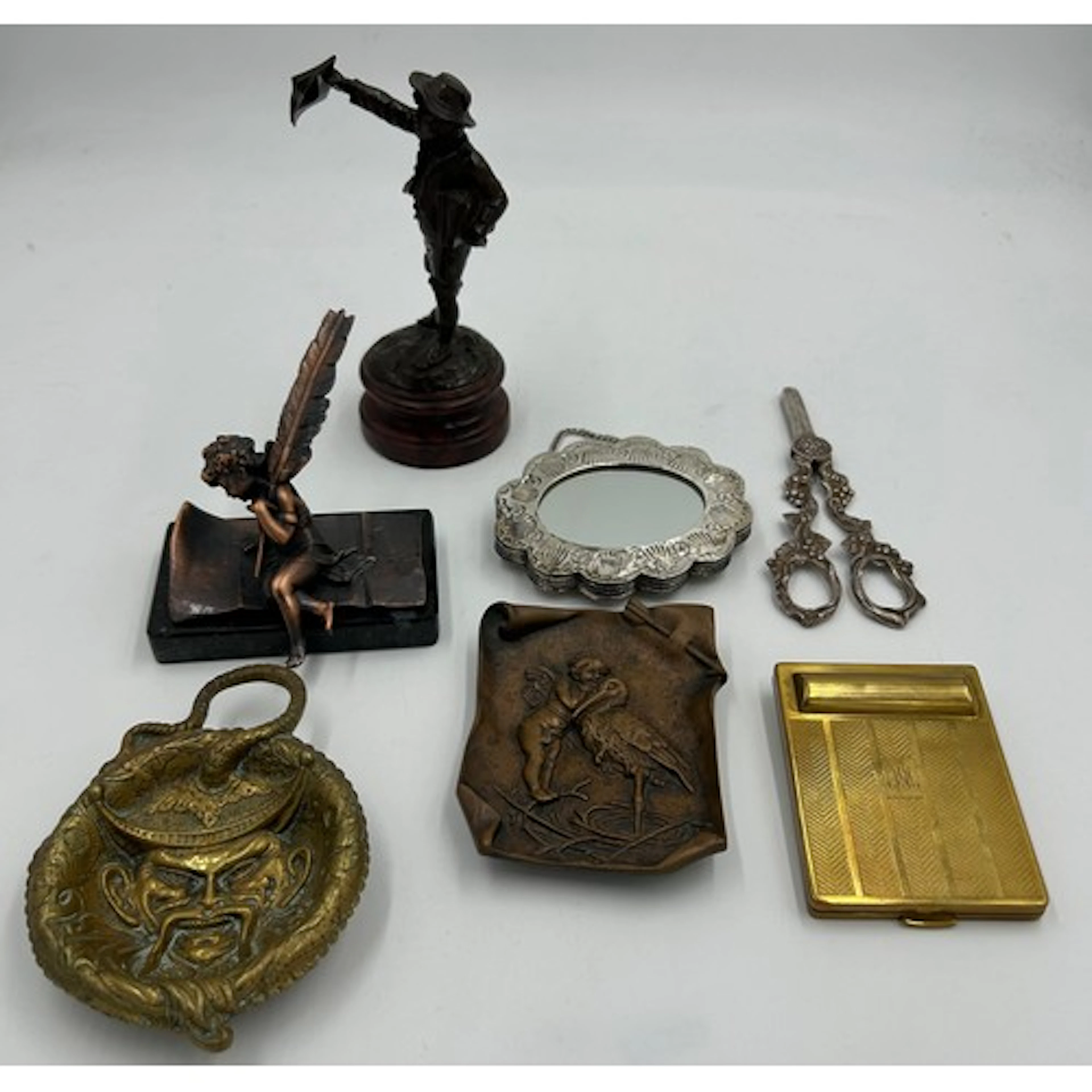 A collection of metal objects to include an oriental brass w...