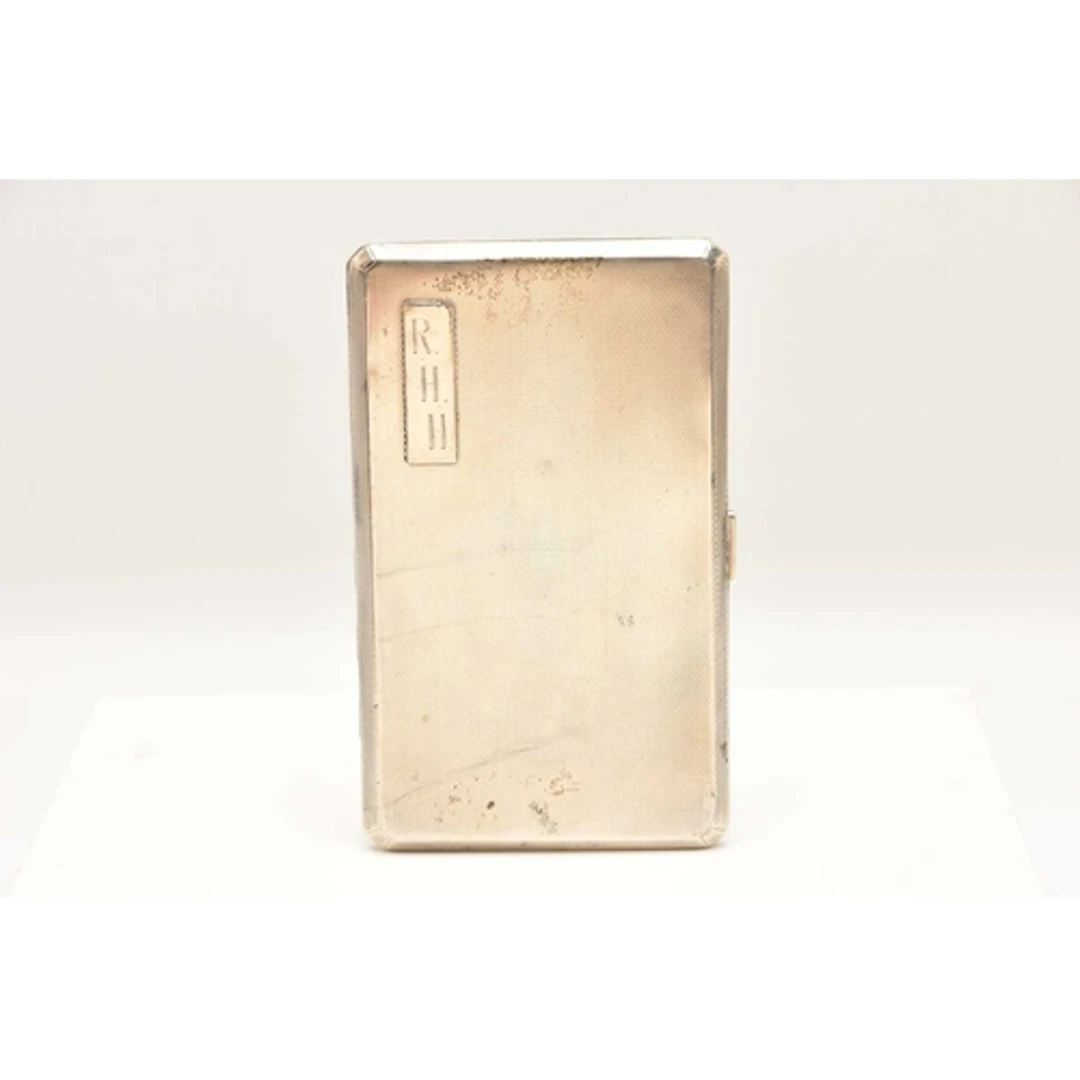 A MID 20TH CENTURY SILVER CIGARETTE CASE, of a rectangular f...