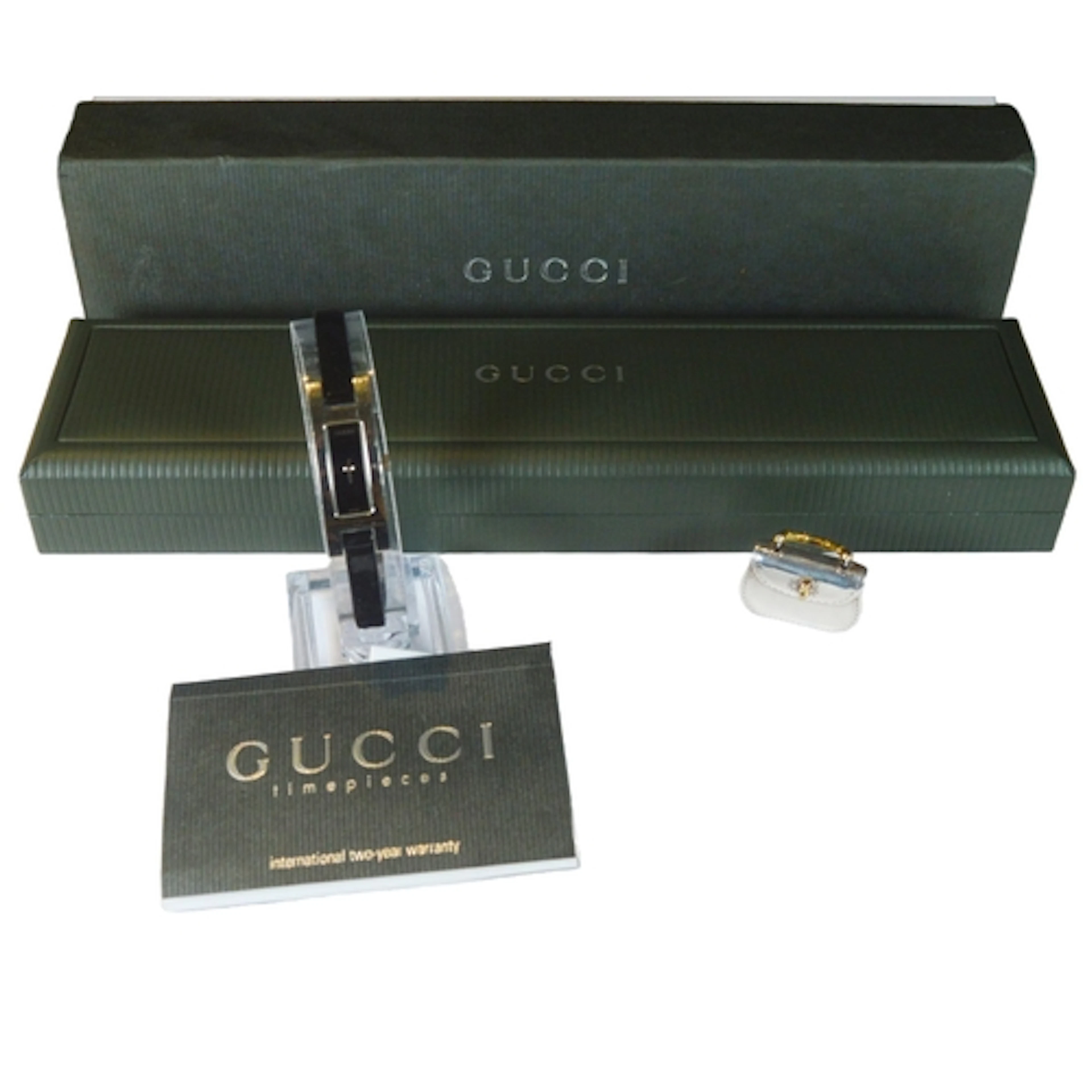 Gucci fashion watch and a Gucci handbag charm.