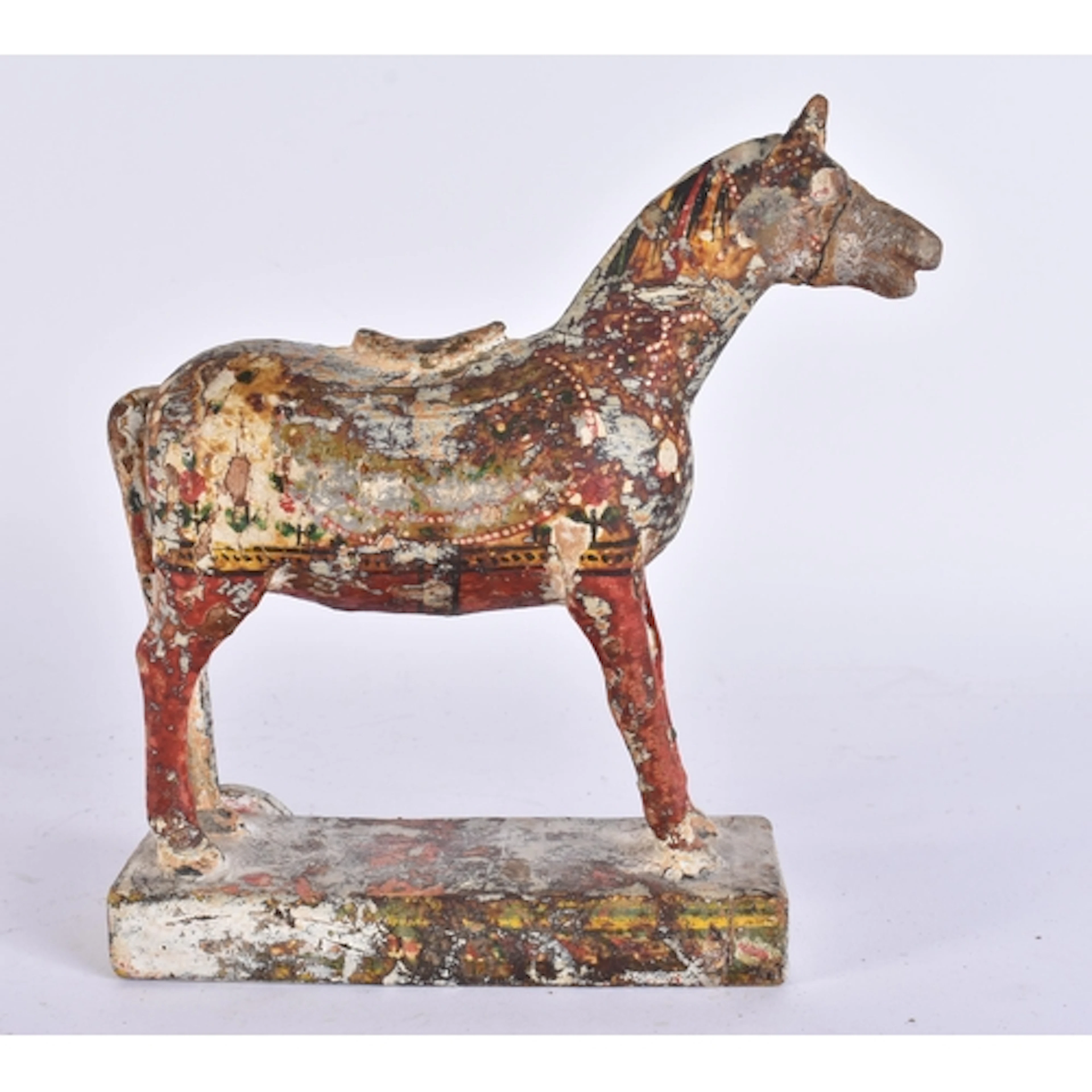 AN ANTIQUE INDIAN PAINTED WOOD FOLK ART TOY HORSE. 18 cm x 1...