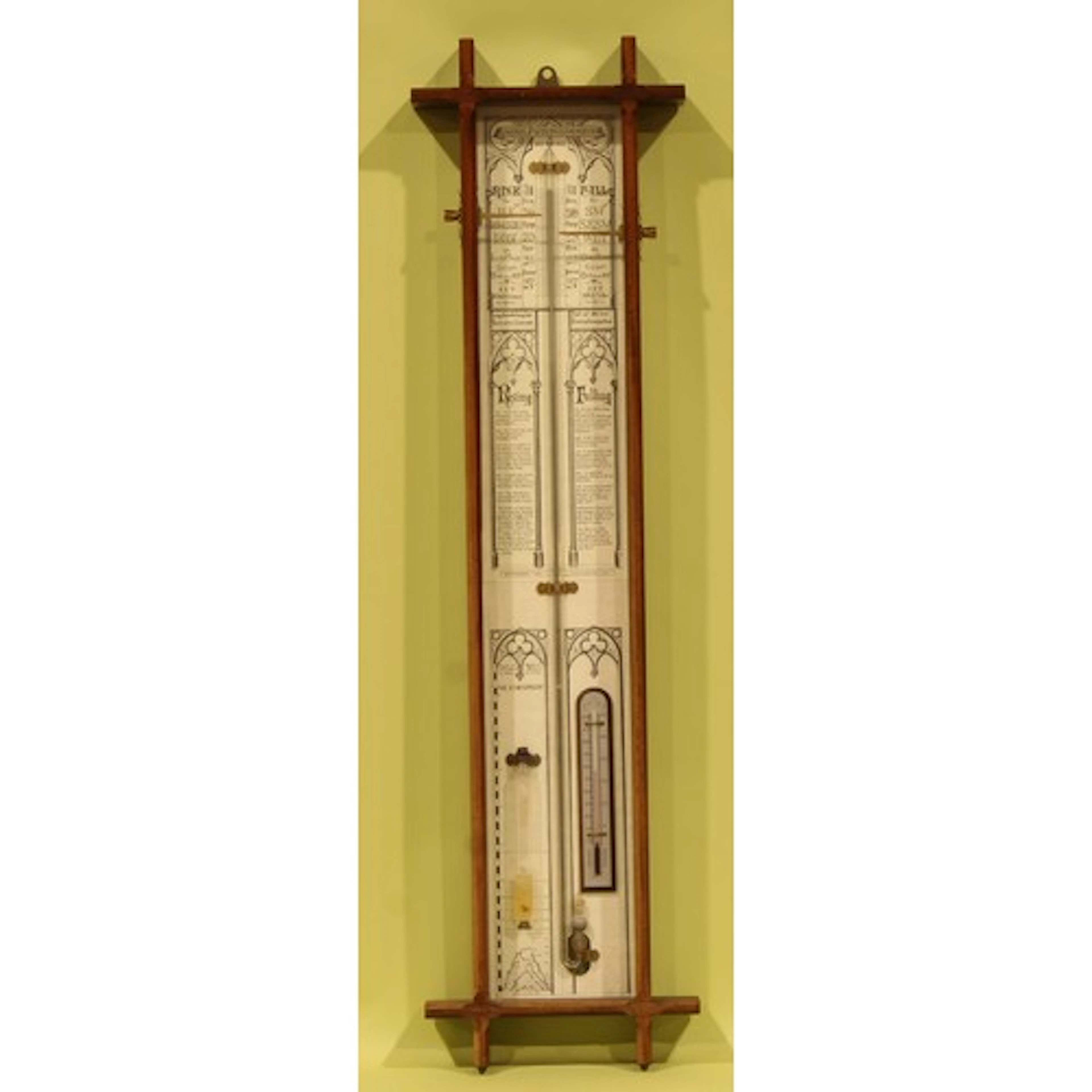 A contemporary mahogany weather station barometer, after the...