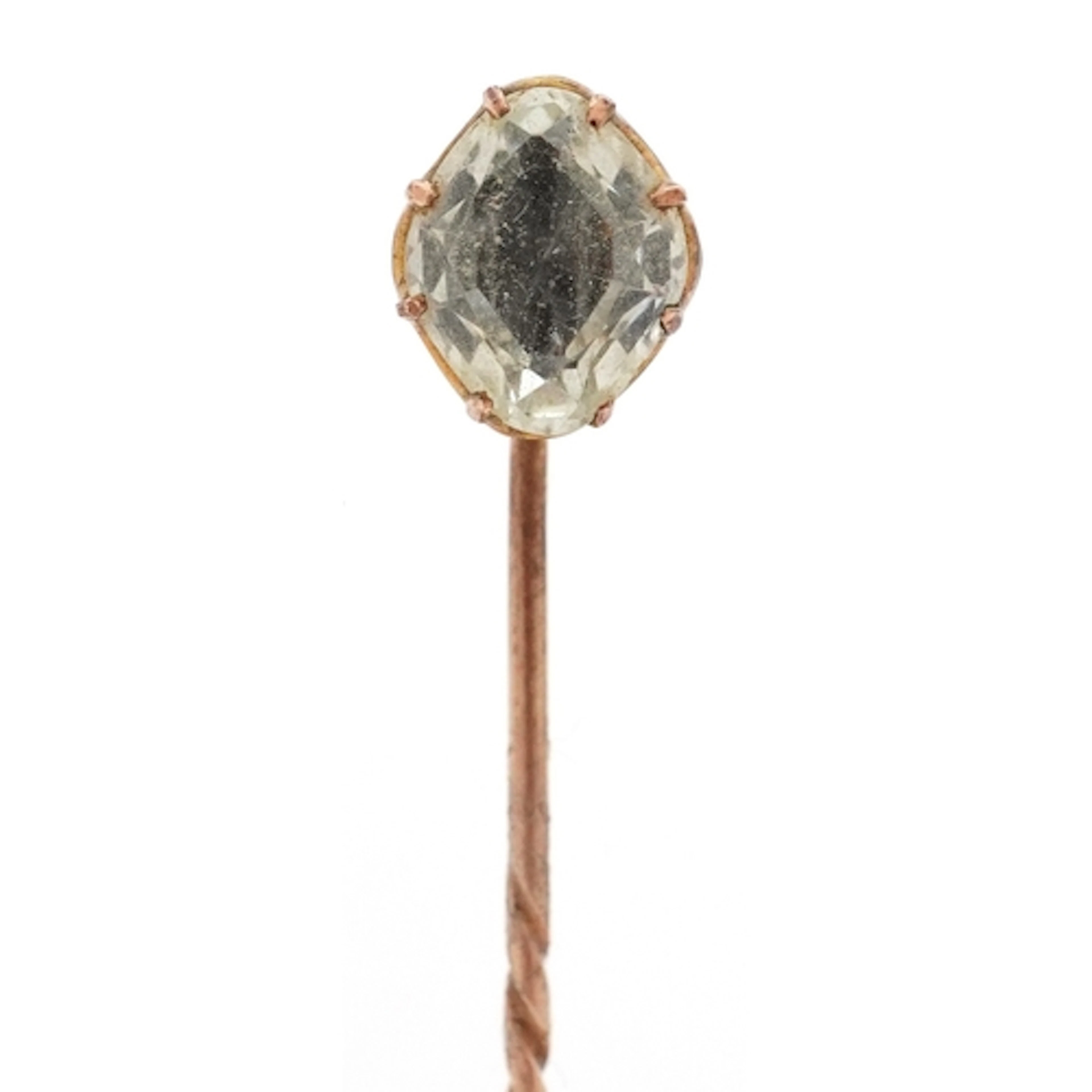Yellow metal blue stone stickpin, 7.6cm in length, 2.7g, hou...