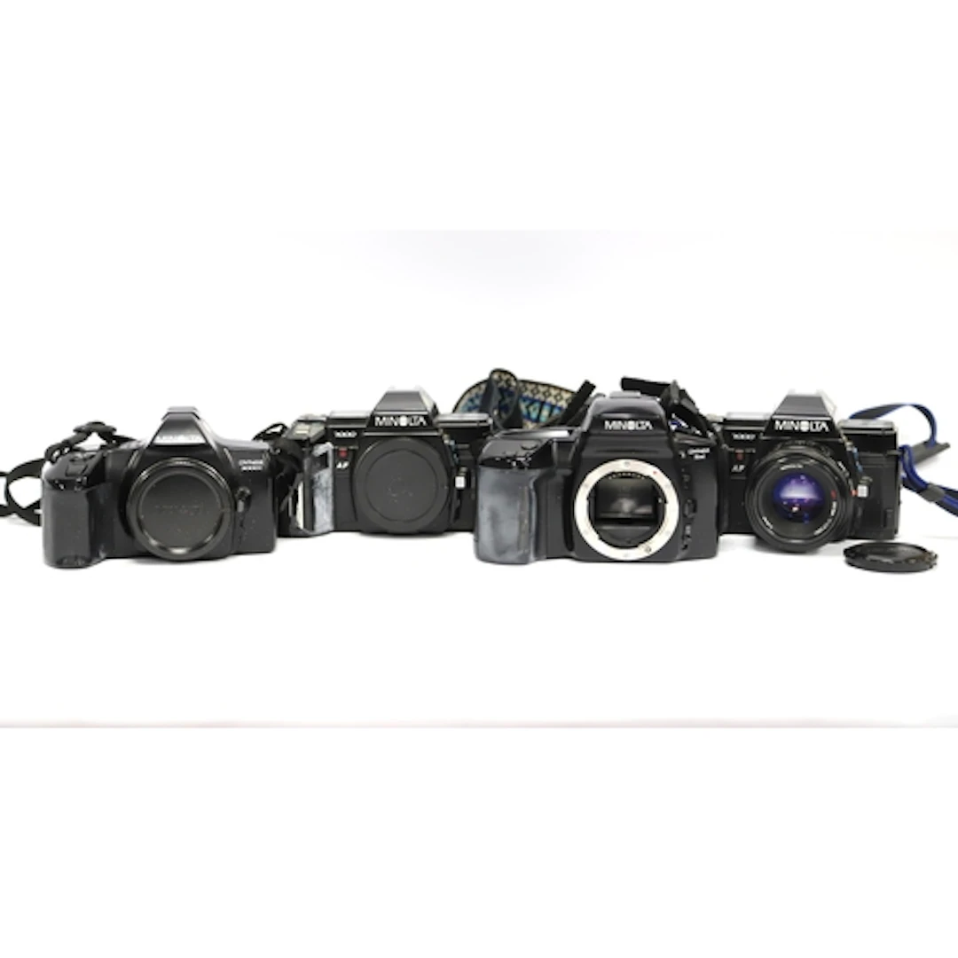 Minolta 35mm SLR Film Cameras to include Minolta 7000 with a...