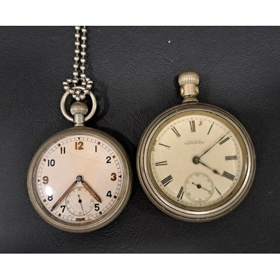 TWO VINTAGE POCKET WATCHES comprising a military pocket watc...