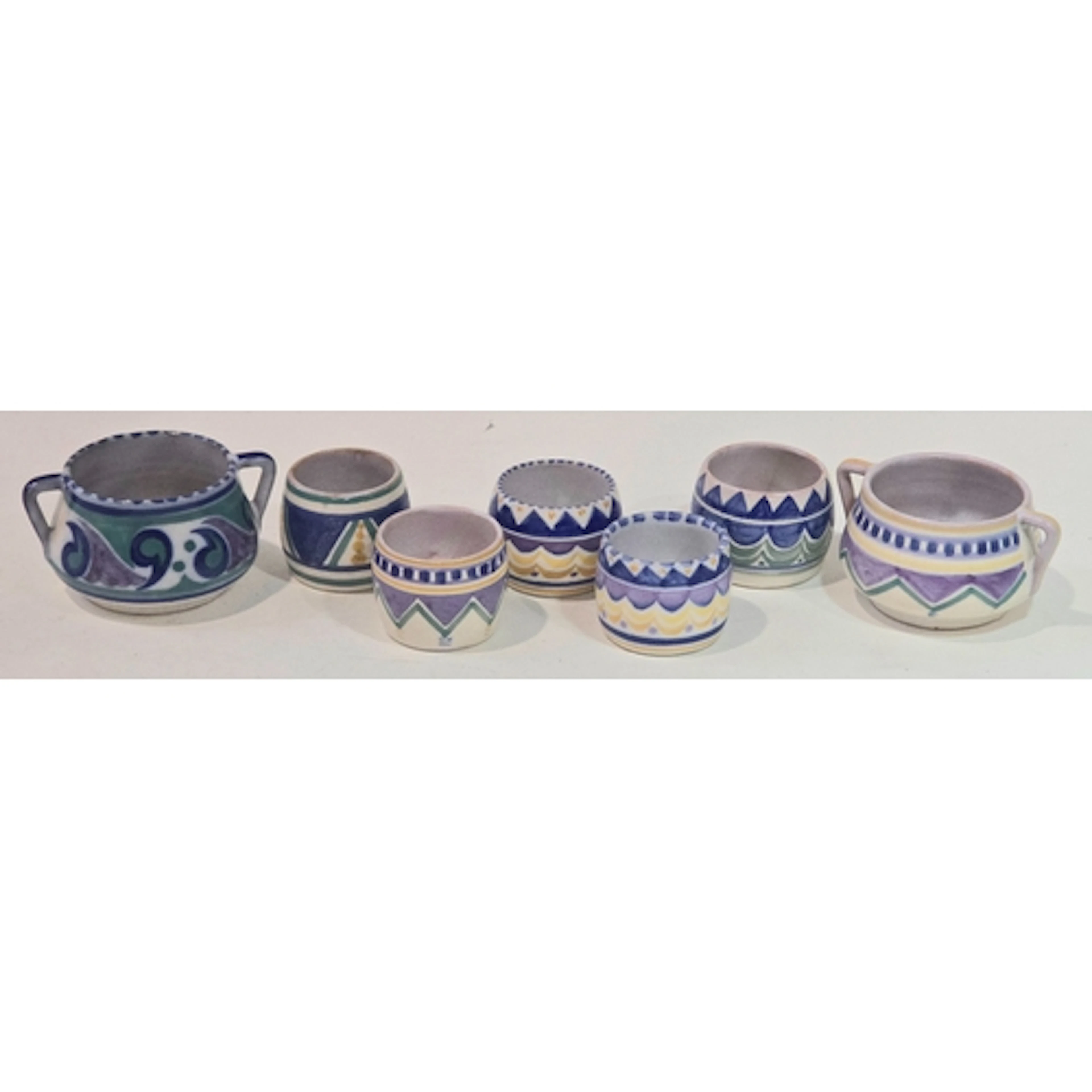 Poole Pottery small group of geometric design egg cups plus ...