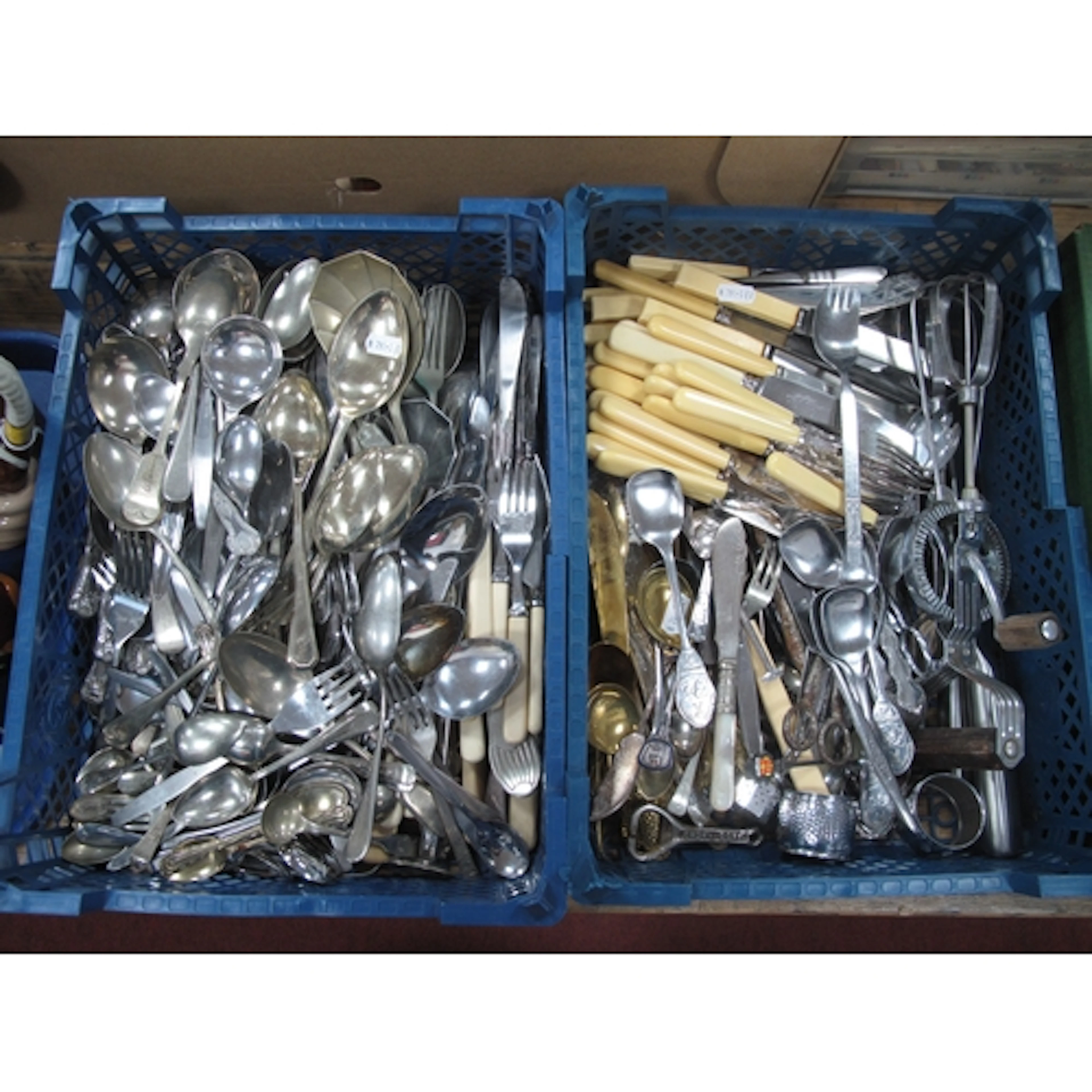 Large quantity of assorted cutlery and kitchenware, predomin...