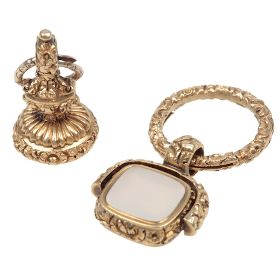 Two hardstone fob seals, 19th century, one of swivel design,...
