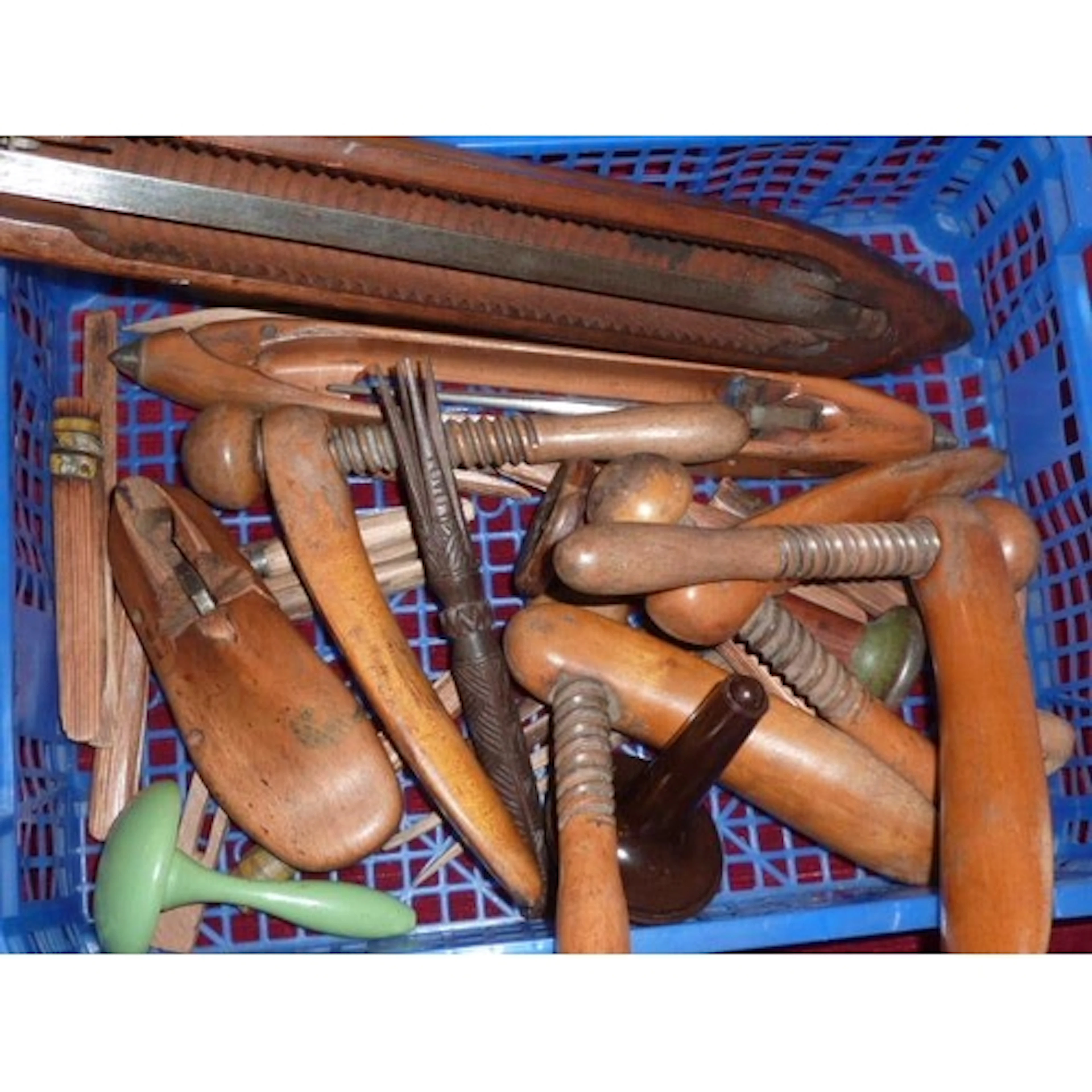 Two pairs of Watts Patent wooden shoe stretchers, two wooden...