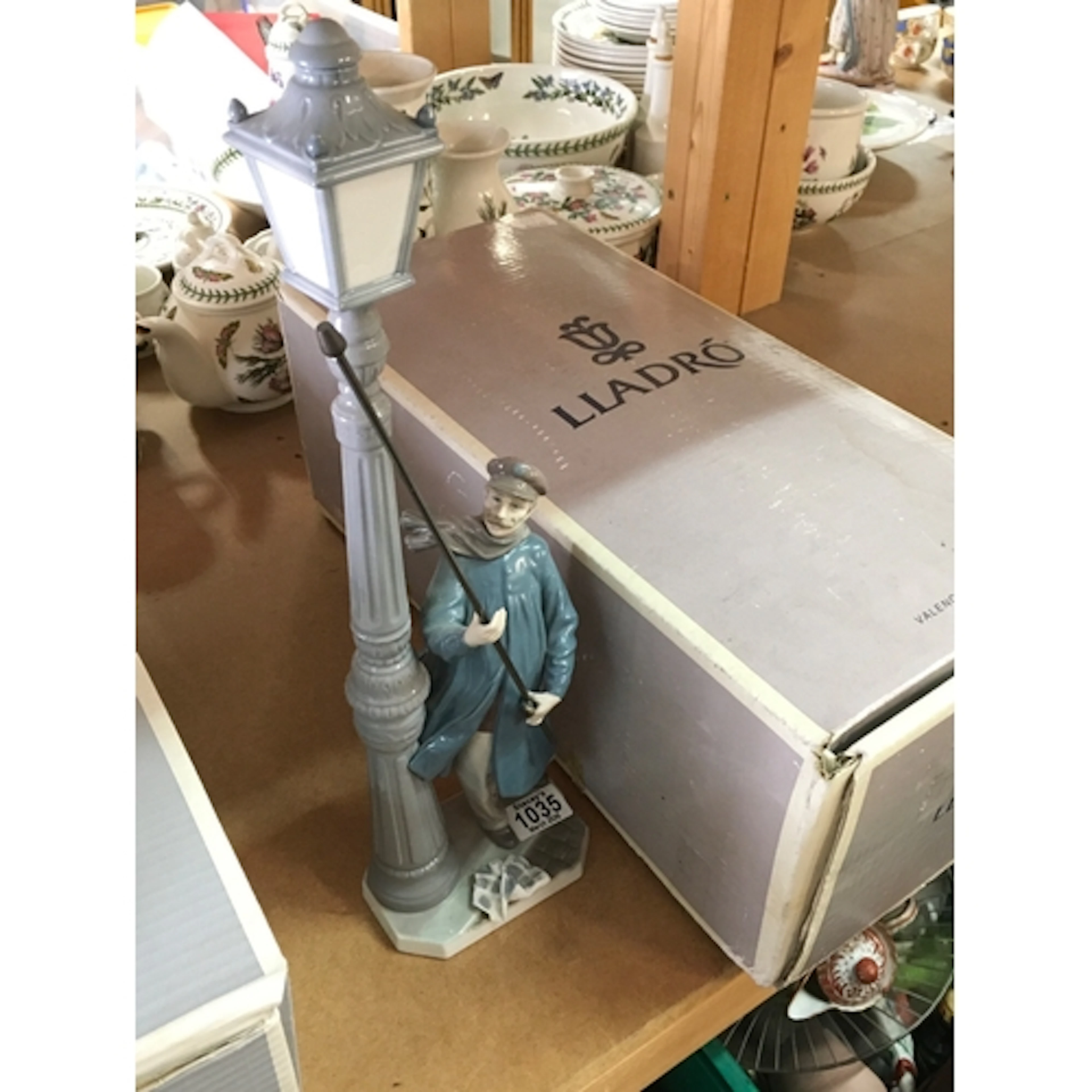 A Lladro Lamplighter boxed porcelain figure (47cm tall)