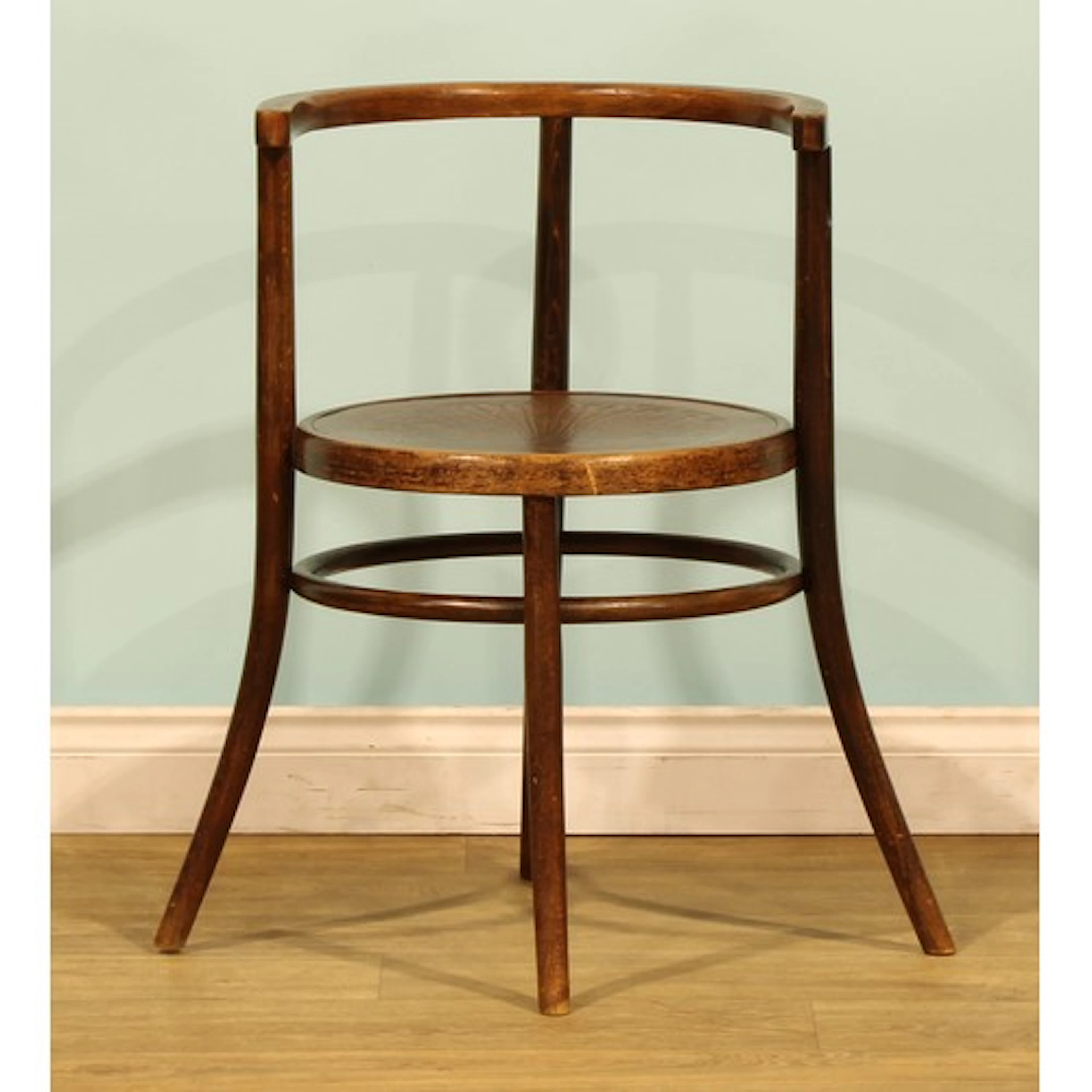 A secessionist bentwood desk chair, by Fischel, the seat sta...