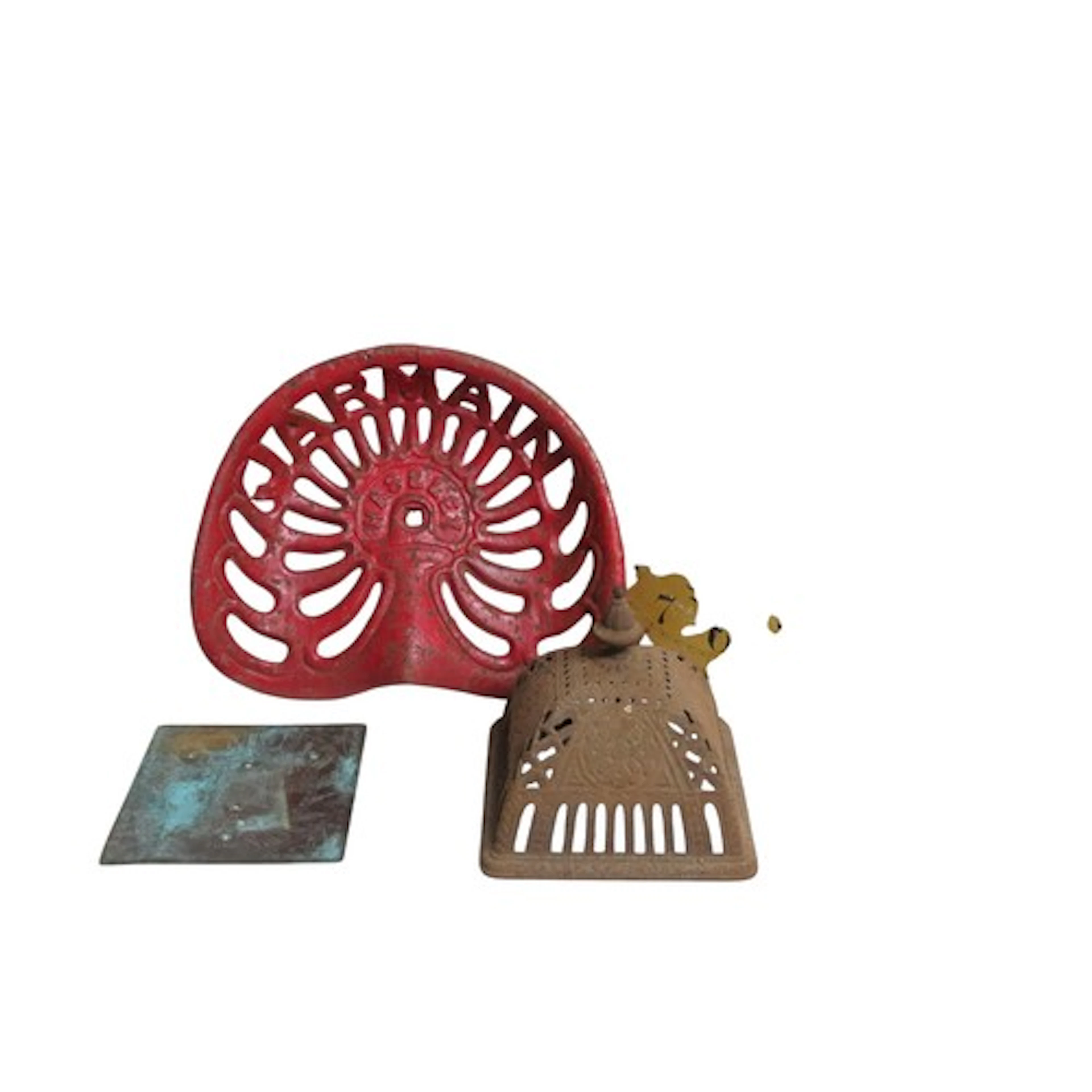 A VINTAGE HASELY CAST-IRON TRACTOR SEAT together with a cloc...