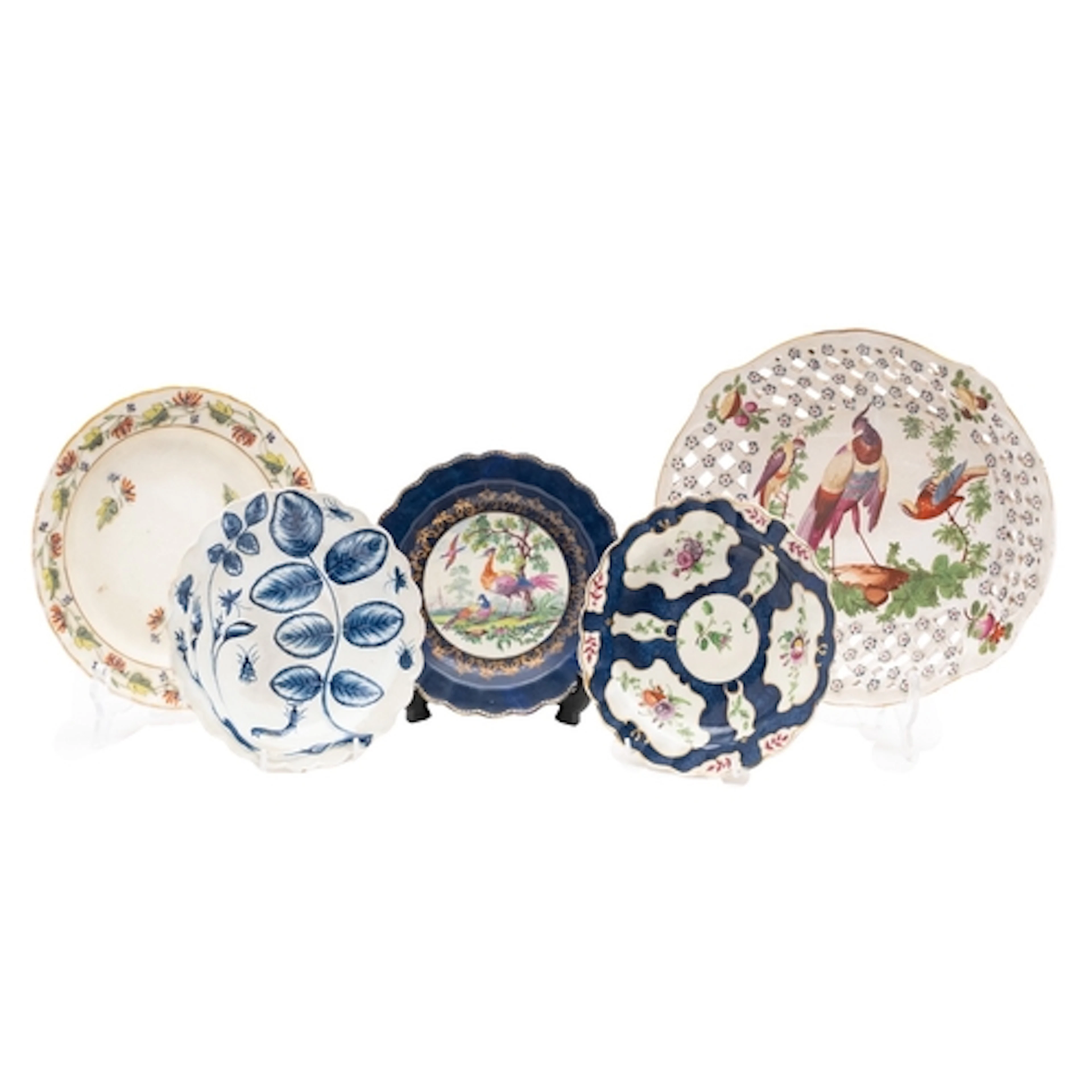 A mixed lot of four 18th century English porcelain plates an...