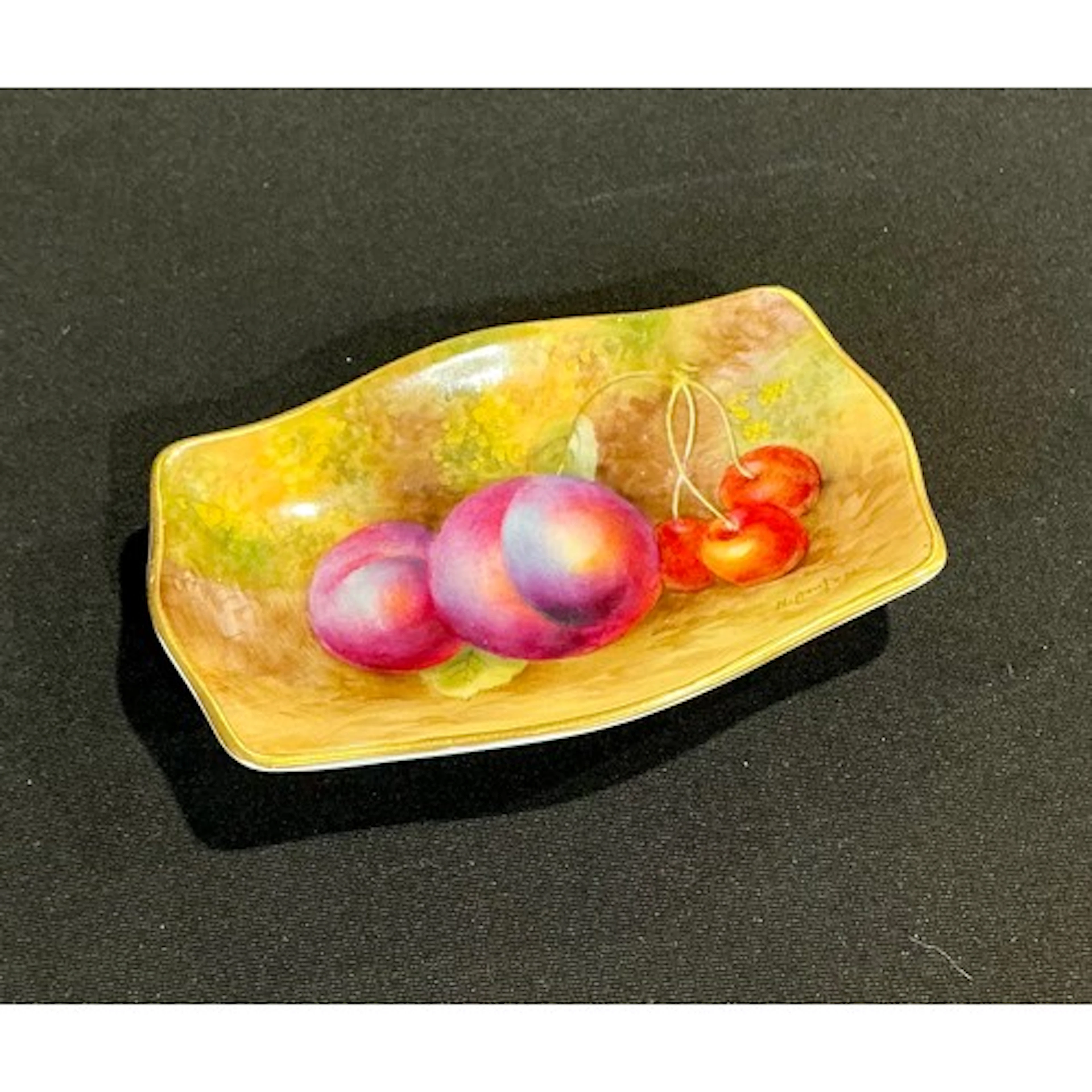 A Royal Worcester shaped rectangular pin tray painted by Har...